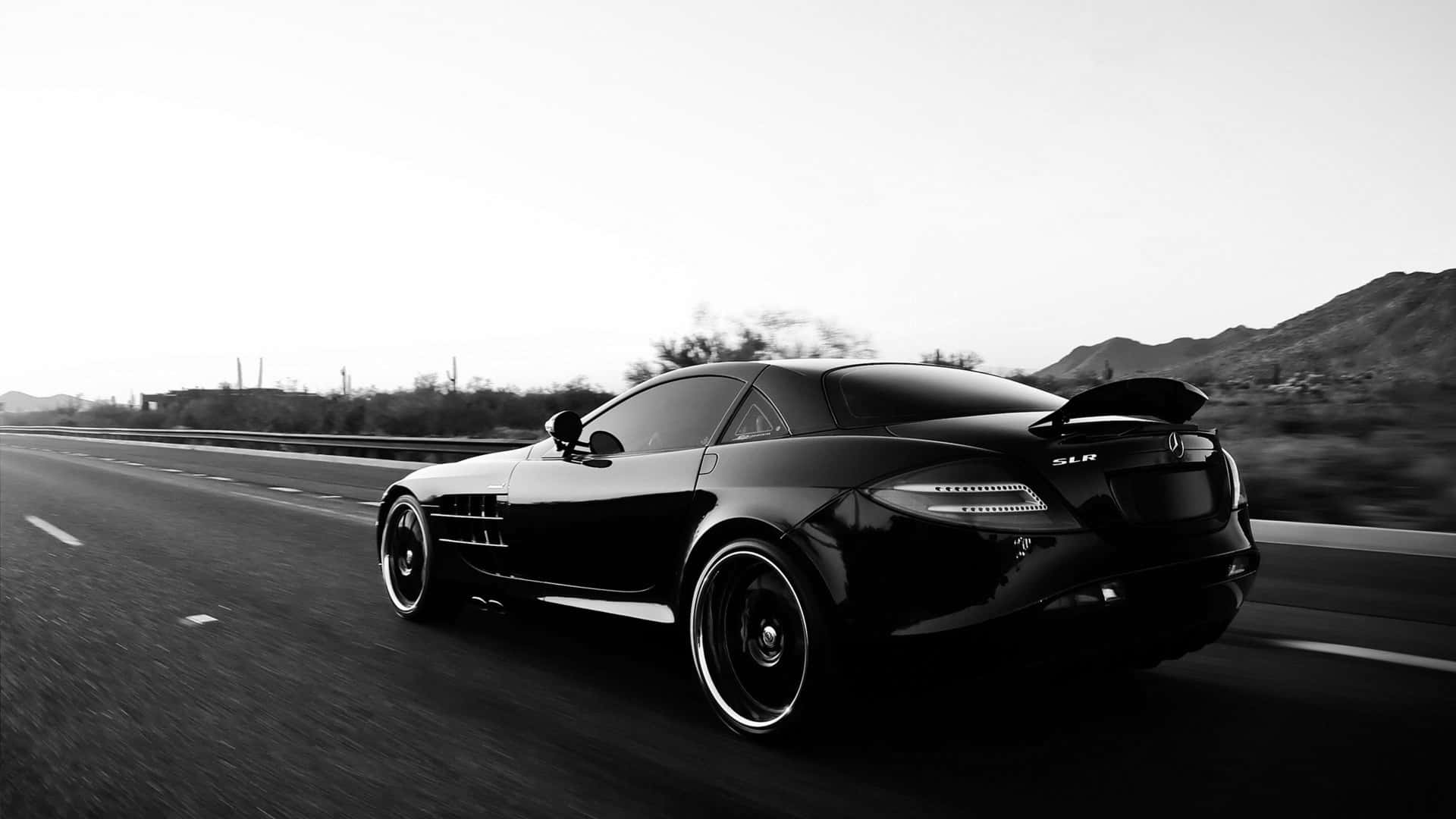 Glistening Black Luxury Car Wallpaper