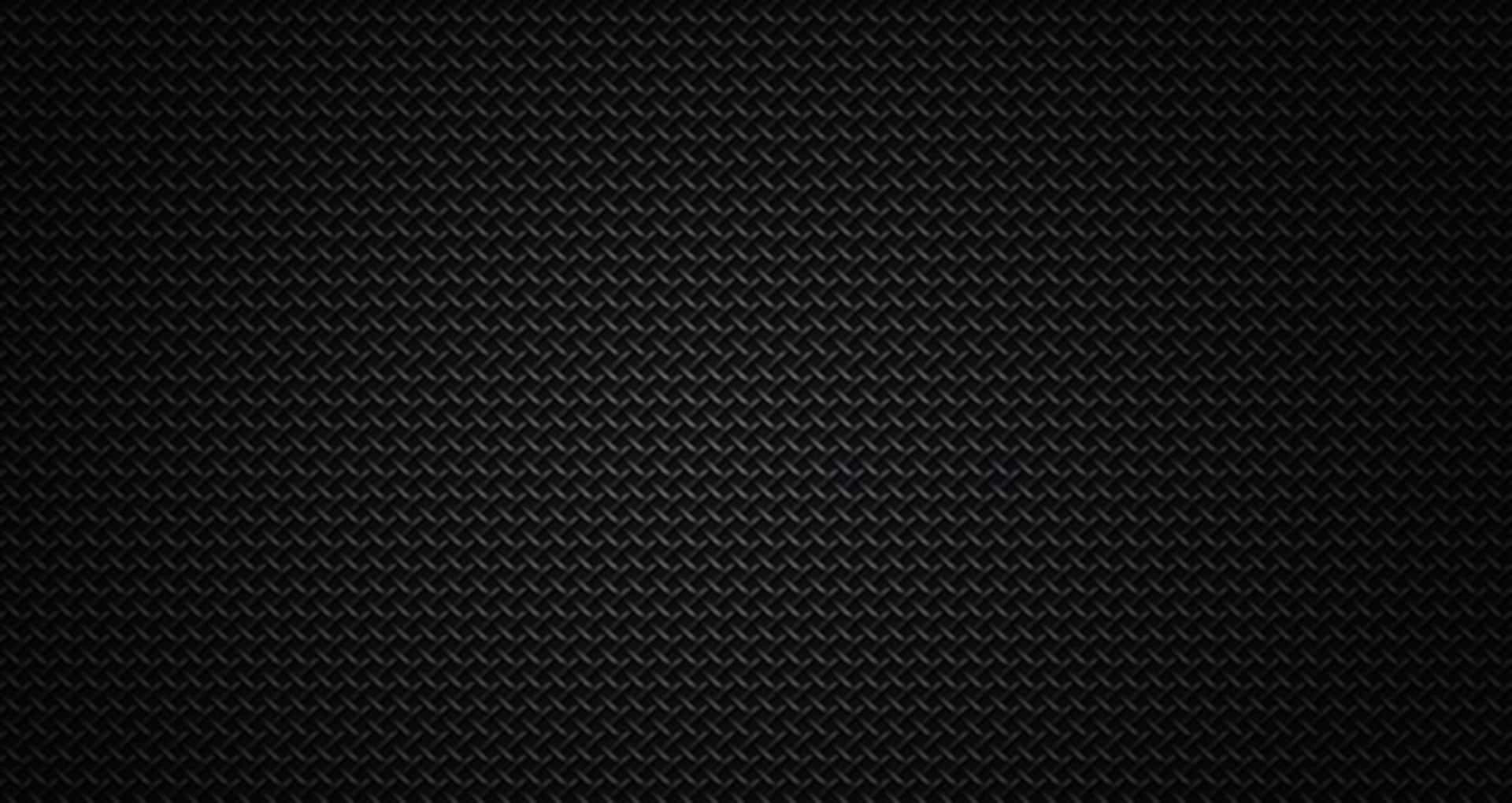 The Impossible Gloss of Black Carbon Fiber Wallpaper