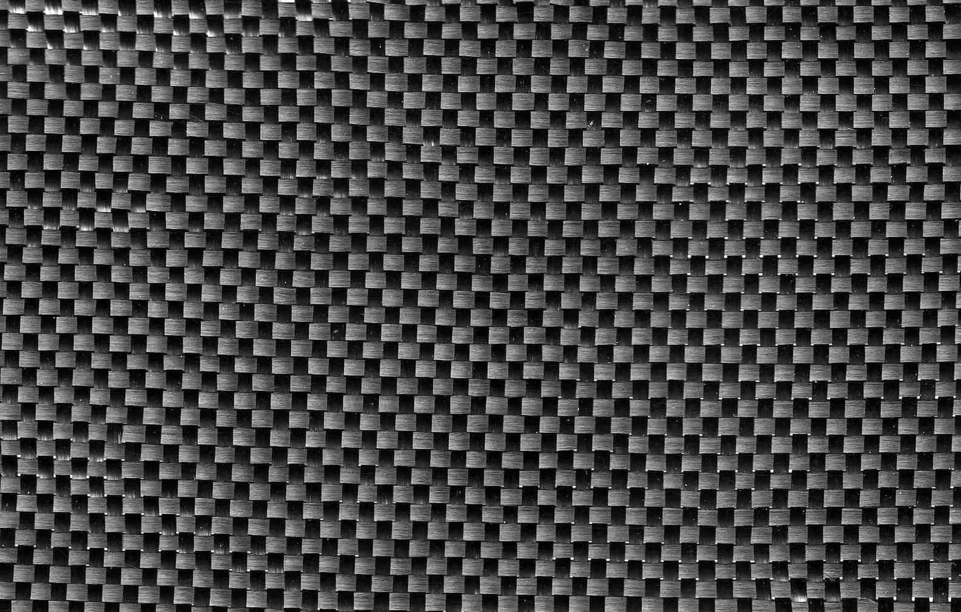 Afslør den Dristighed af sort kulstof fiber Wallpaper