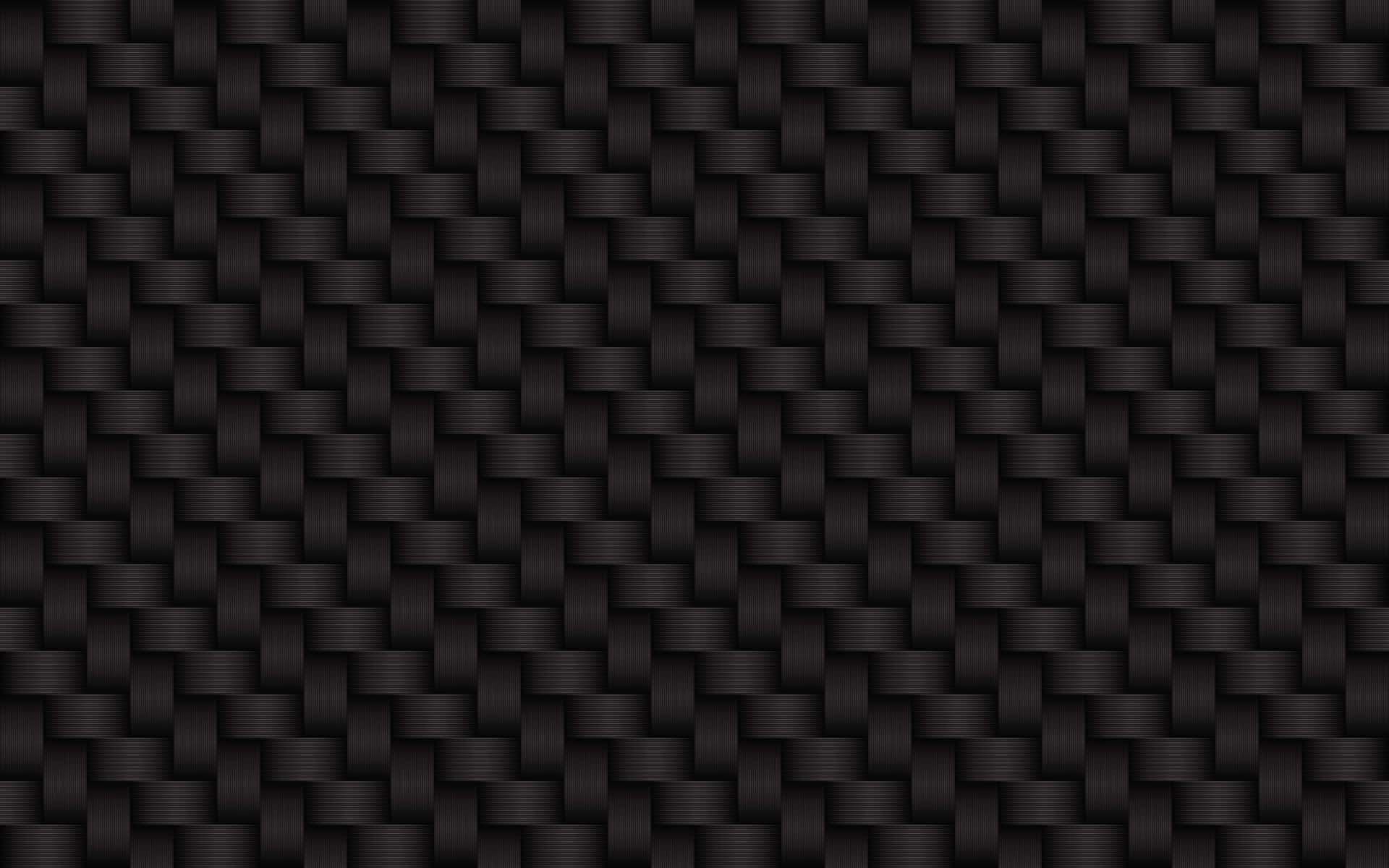 Go bold with black carbon fiber Wallpaper