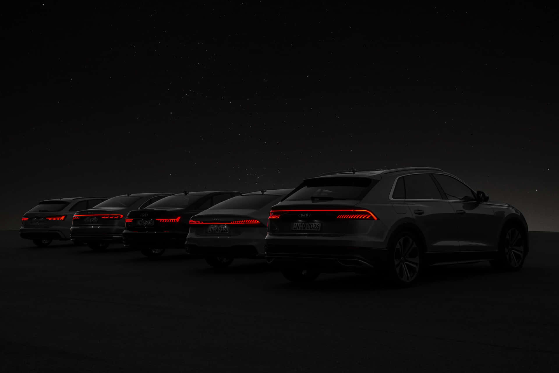 Black Cars Nighttime Formation Wallpaper