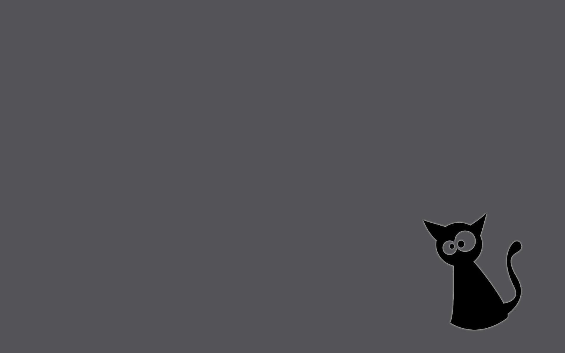 Eineschwarze Katze Sitzt Auf Einem Grauen Hintergrund.