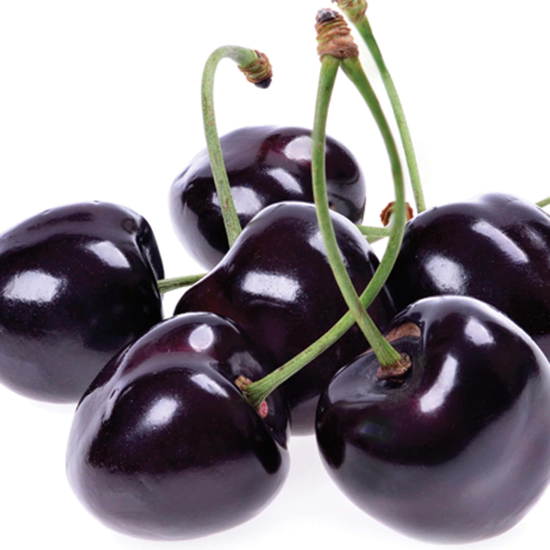 “A bushel of black cherries fresh from the farm.” Wallpaper