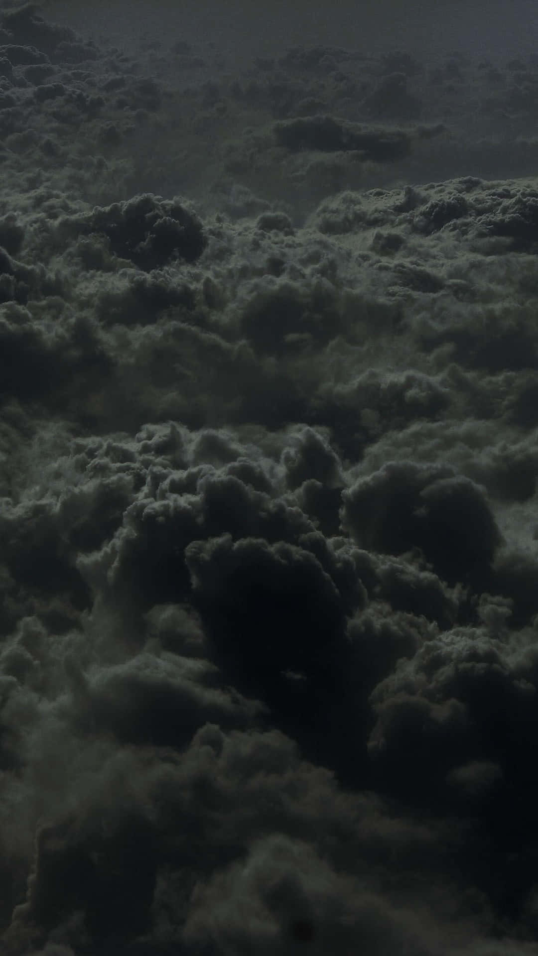 Black Clouds Covering A Vast Area Wallpaper