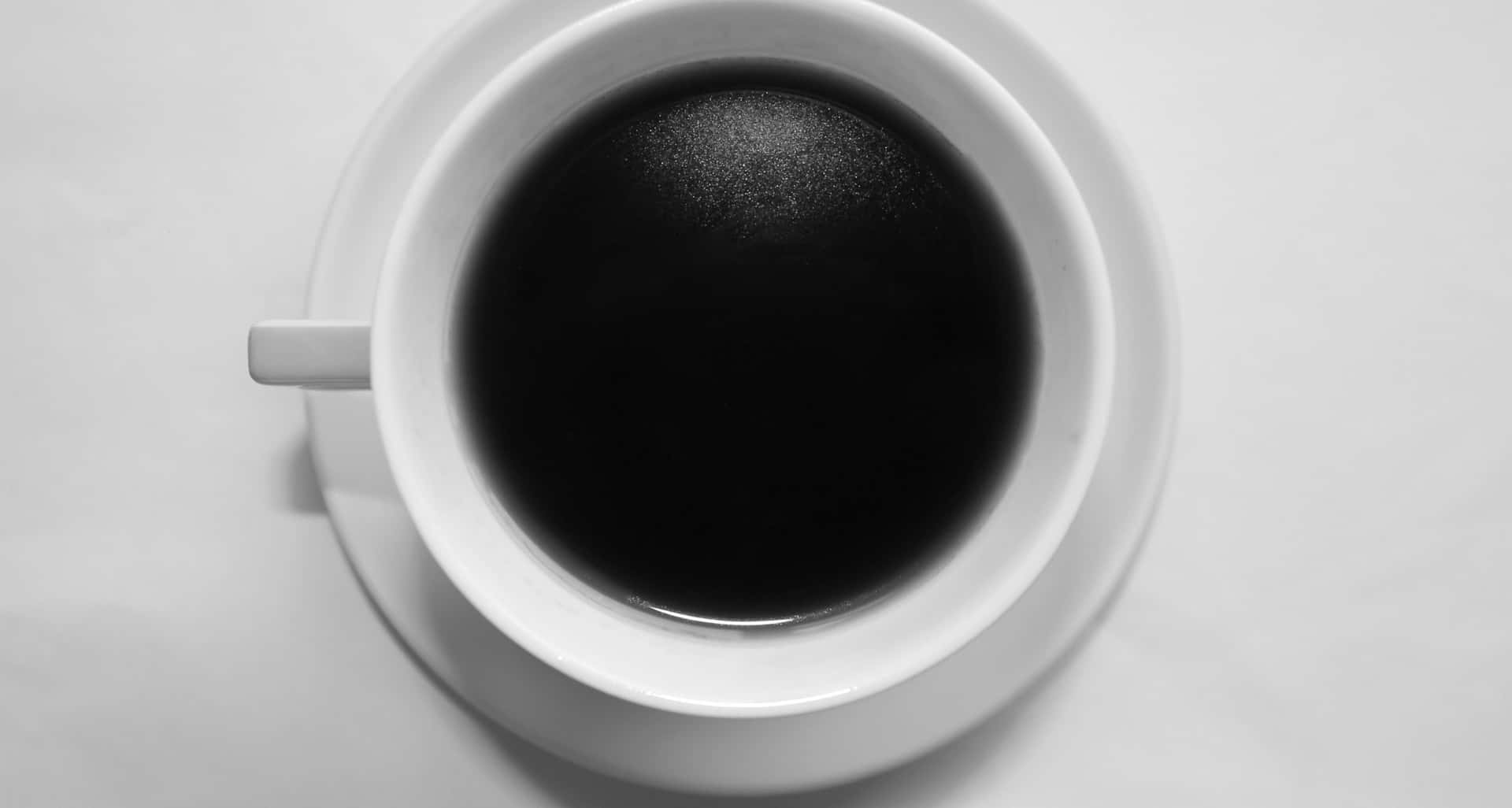 Unataza De Café Negro Para Darte Energía Por La Mañana. Fondo de pantalla