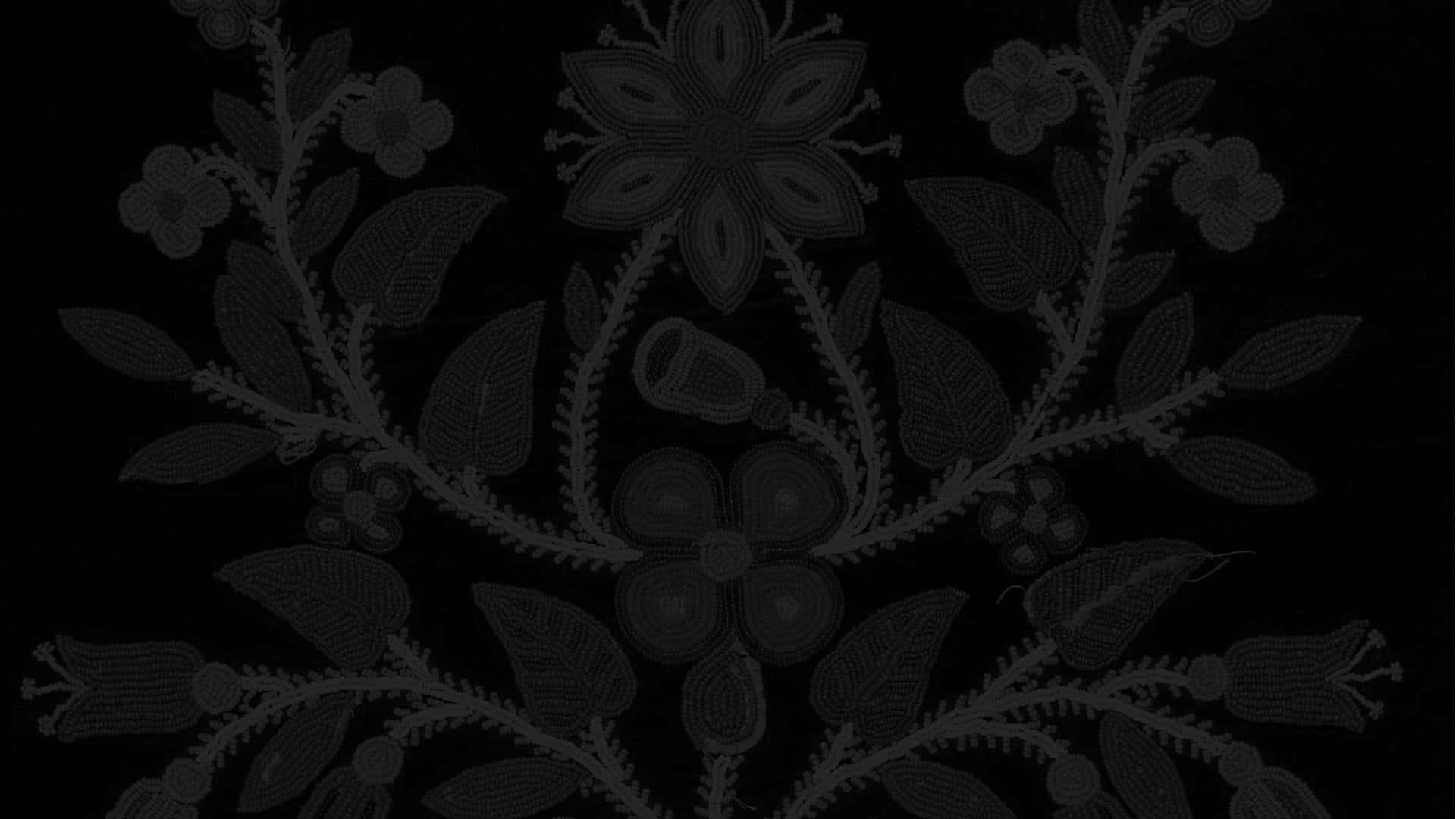 A Black And White Floral Pattern On A Black Background