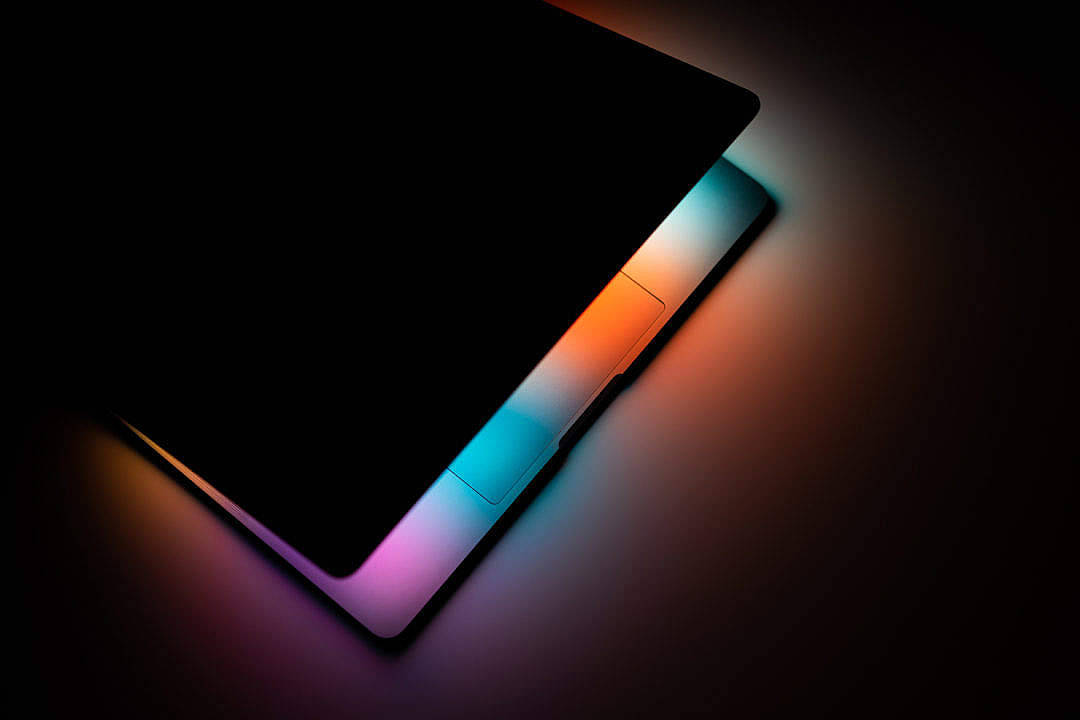 Black Color Laptop With Half-open Screen Wallpaper