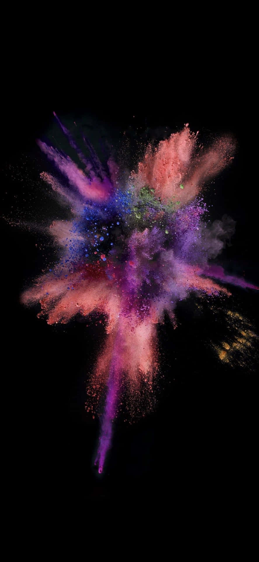 Et farvestrålende pulver eksplosion på en sort baggrund Wallpaper