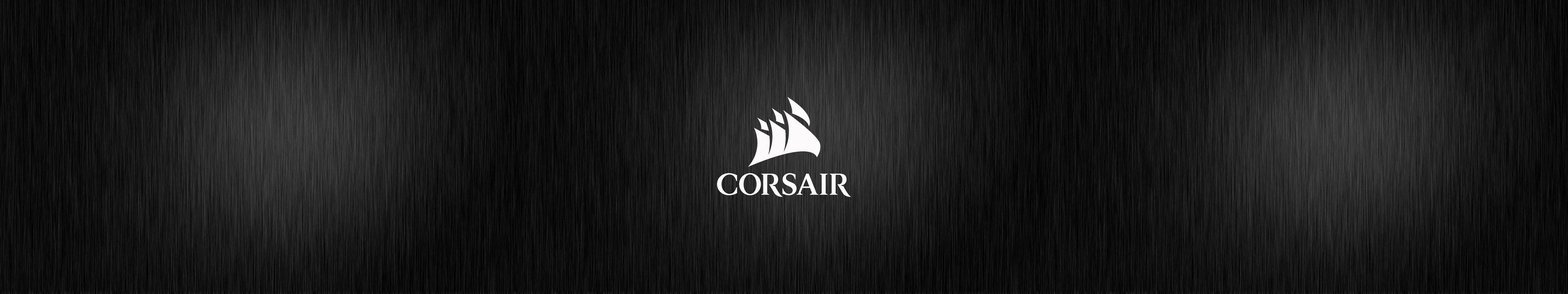 Upgrade your workstation with the latest Corsair black triple monitor Wallpaper