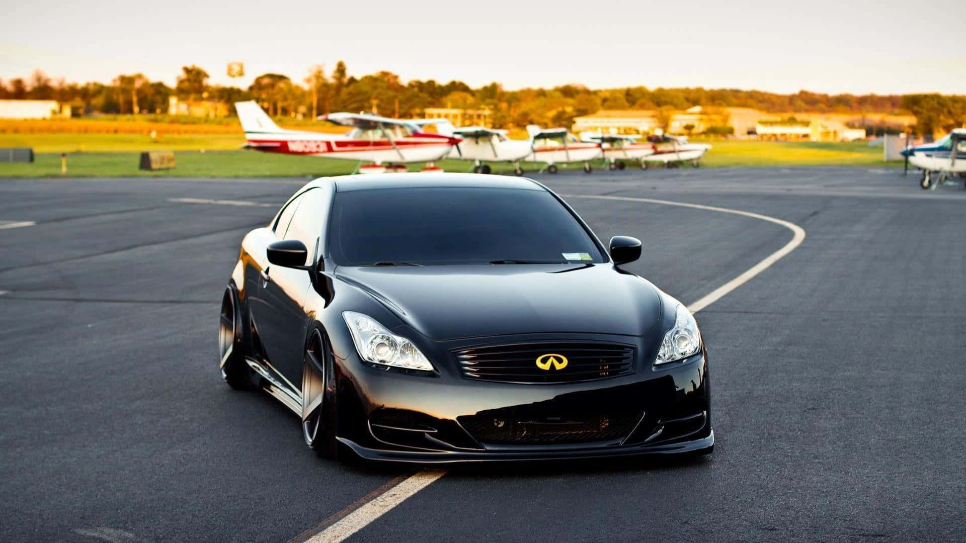 Black Coupe Airport Hangar Wallpaper