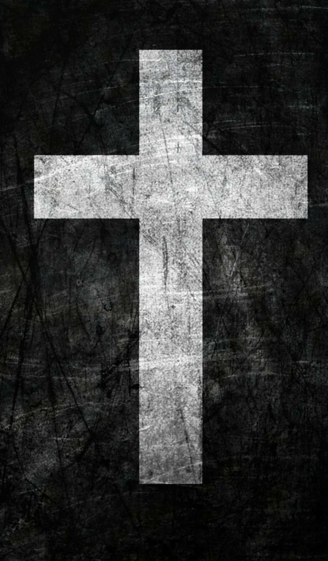 Et kors på en sort baggrund Wallpaper