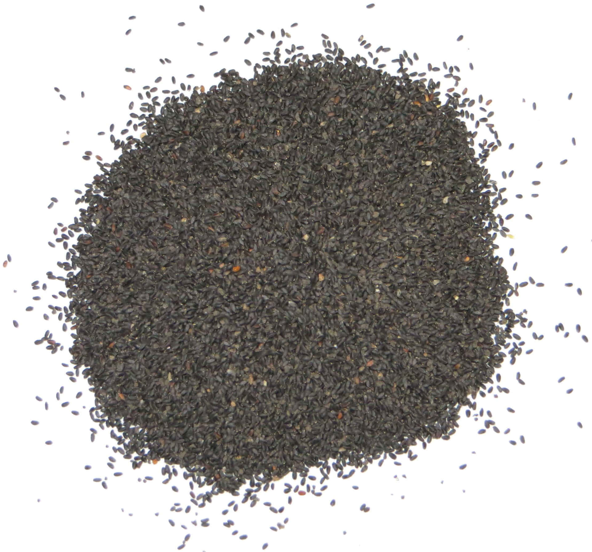 Spicy Whole and Ground Black Cumin Seeds Wallpaper