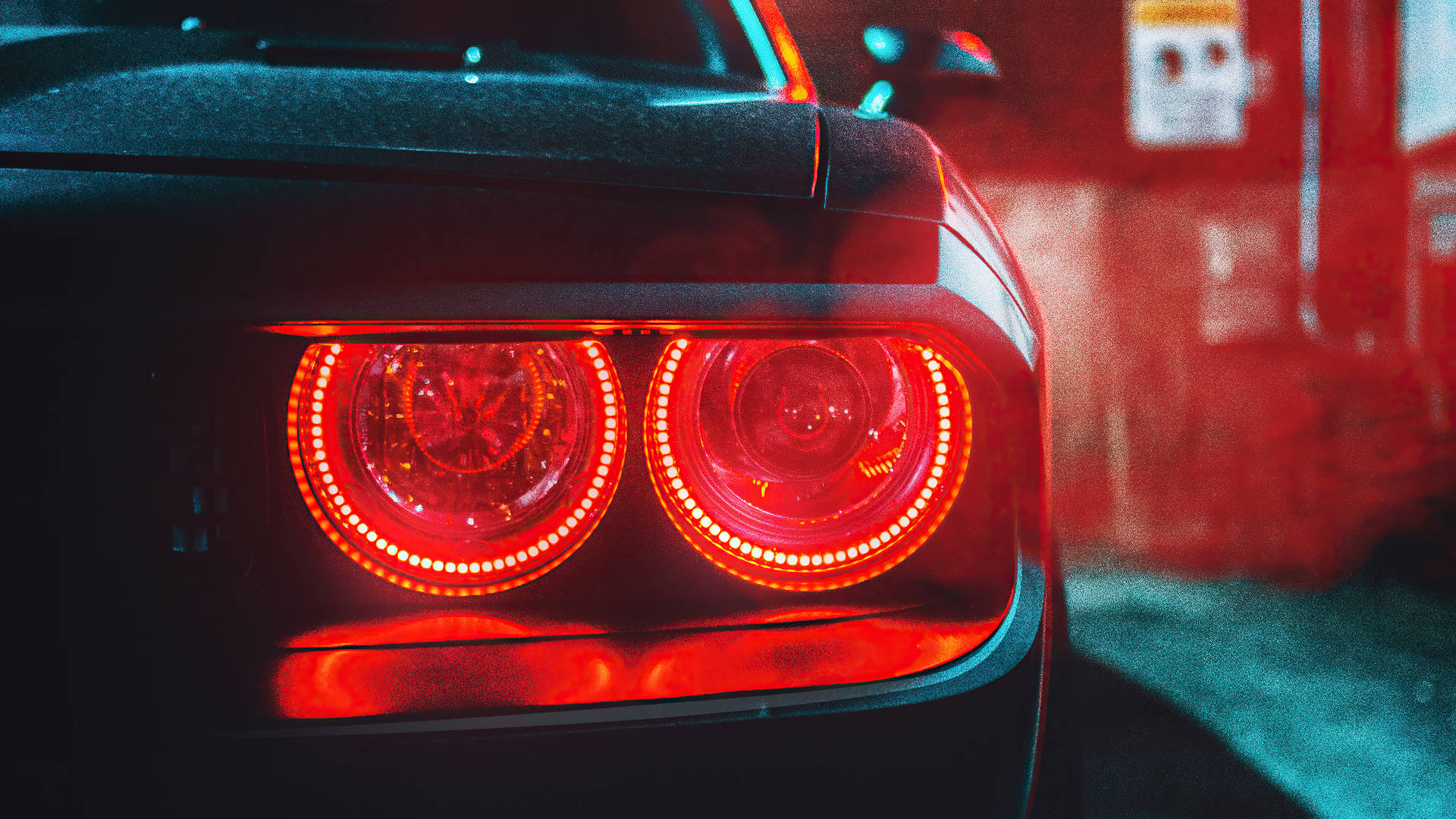 Power and Elegance - Black Dodge Challenger Demon 4K with striking red tail lights. Wallpaper