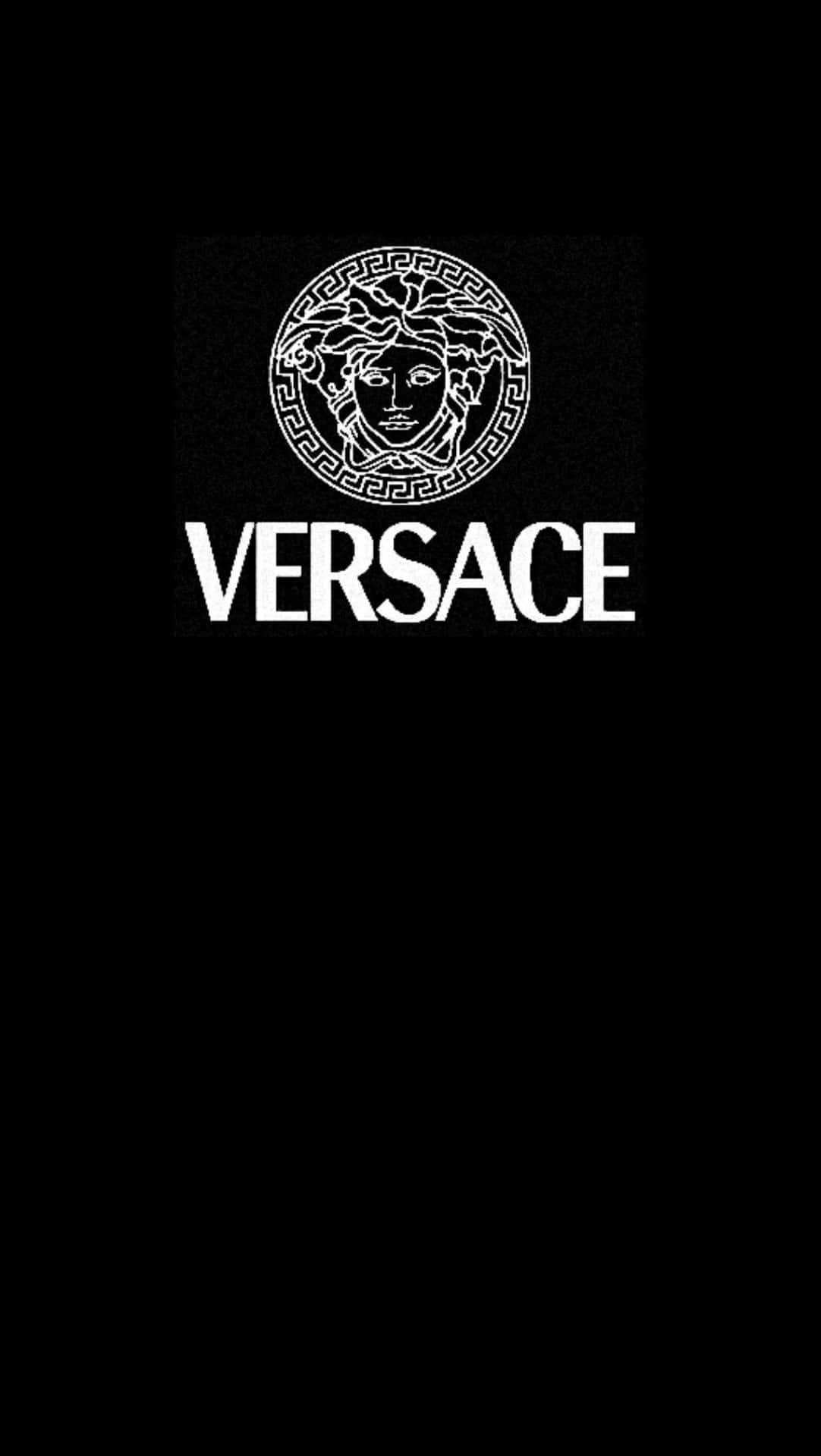 Versace Logo On A Black Background Wallpaper