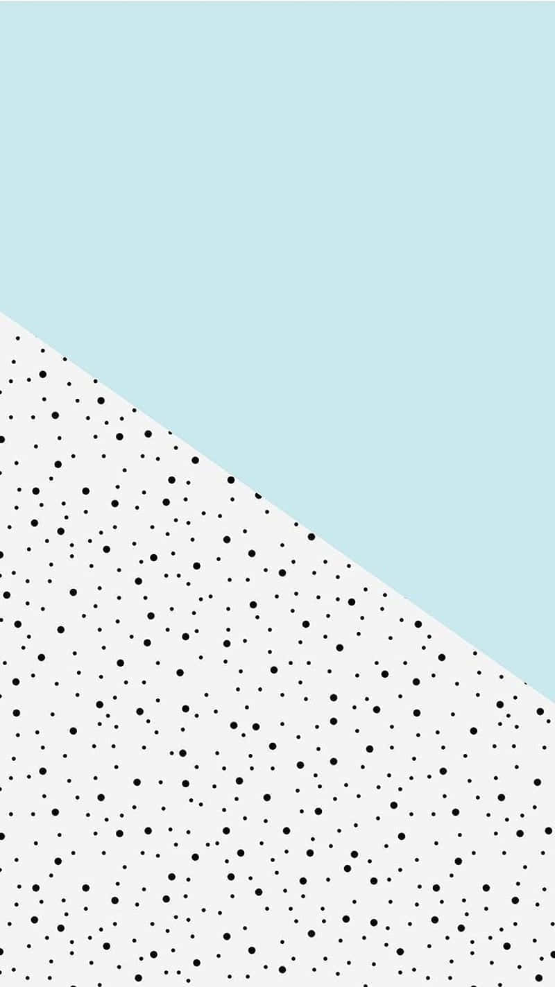 A White And Blue Polka Dot Pattern On A Blue Background Wallpaper