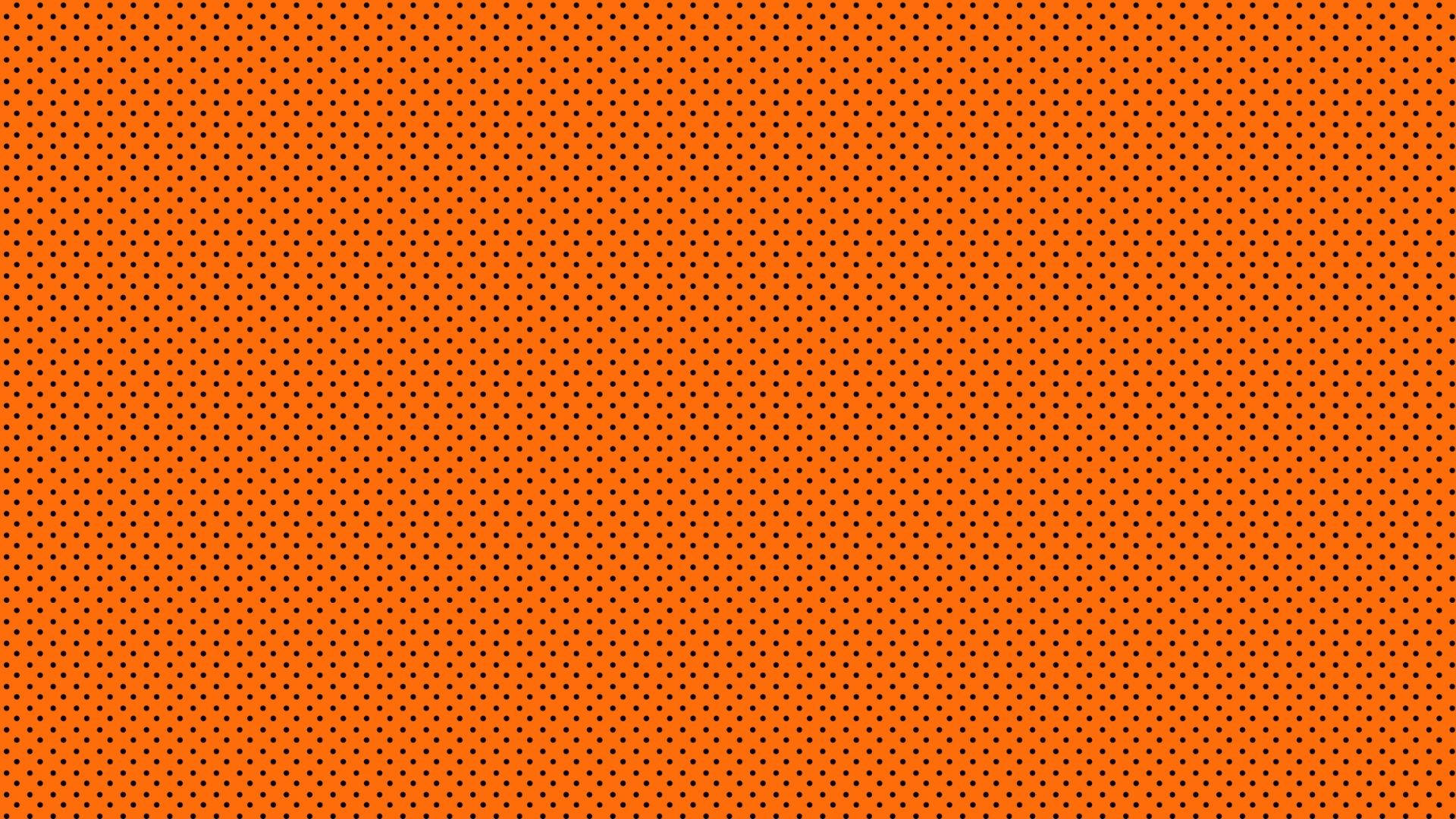 Black Dots On An Orange Background Wallpaper