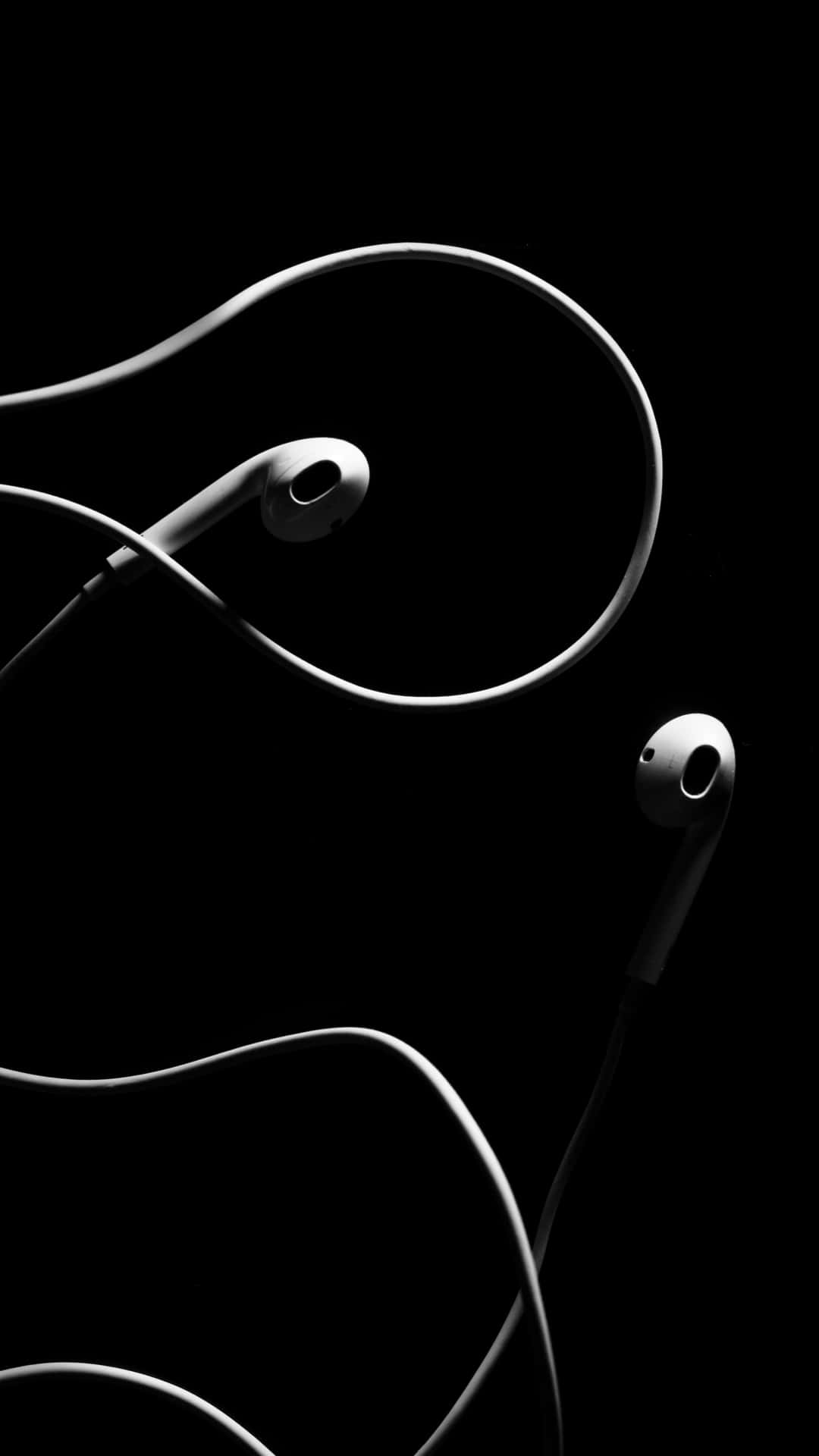 Tampilan Artistik Earphone Hitam Wallpaper