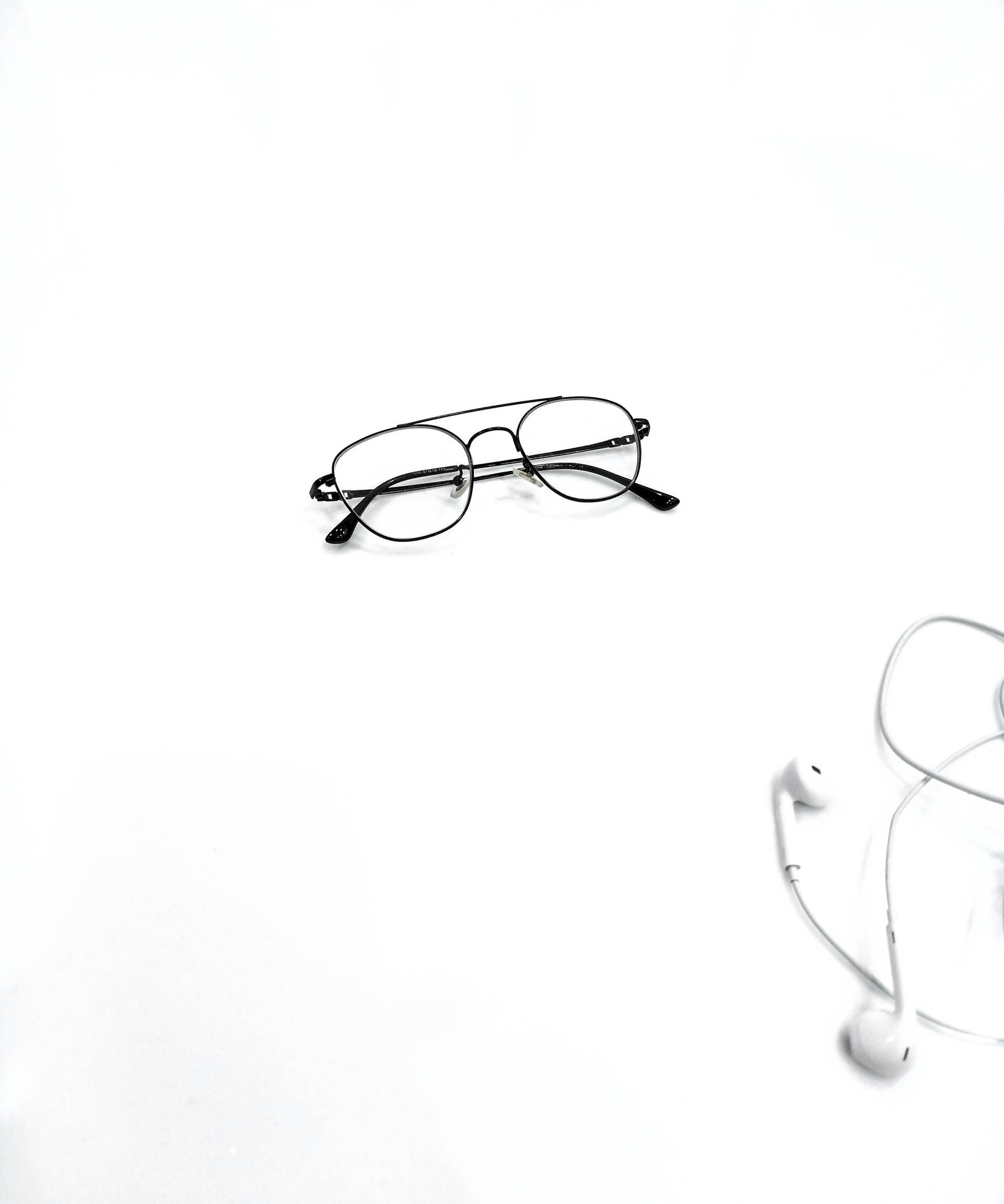 Black Eyeglasses And Headset Plain Aesthetic Wallpaper