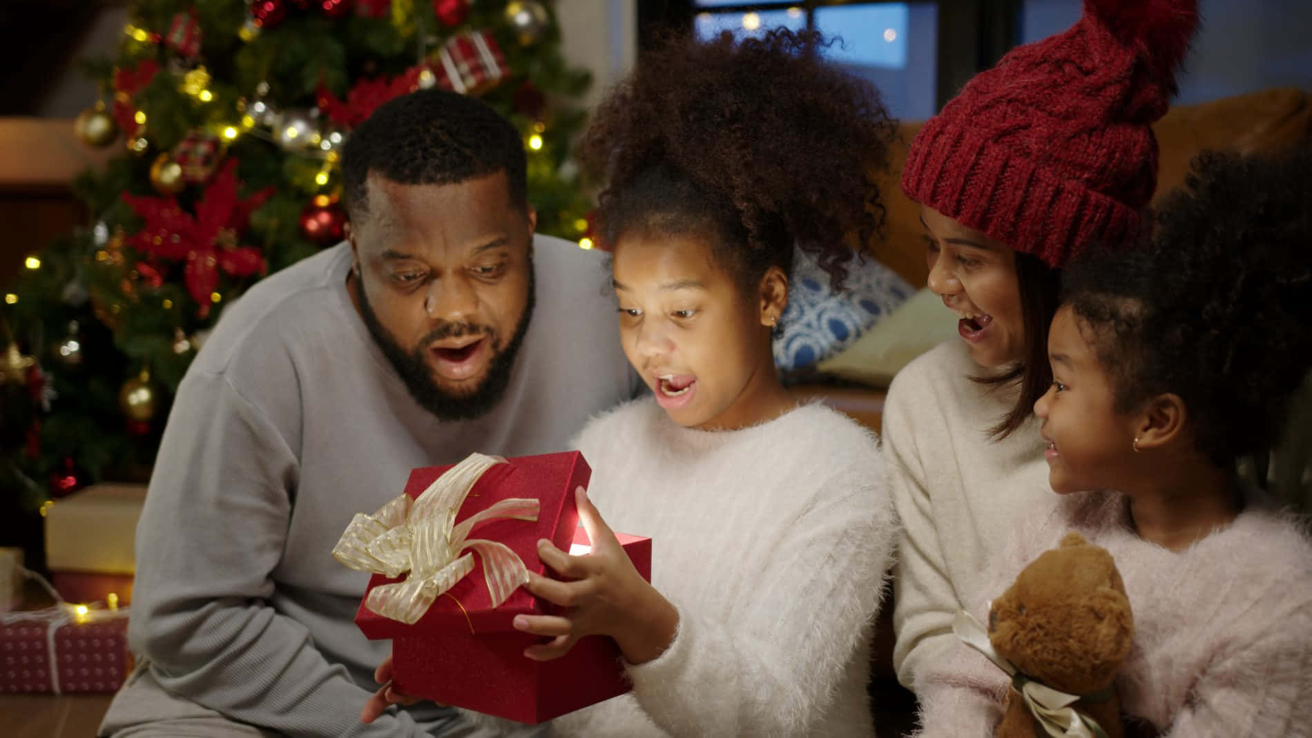 Black Family Christmas Gift Opening Picture