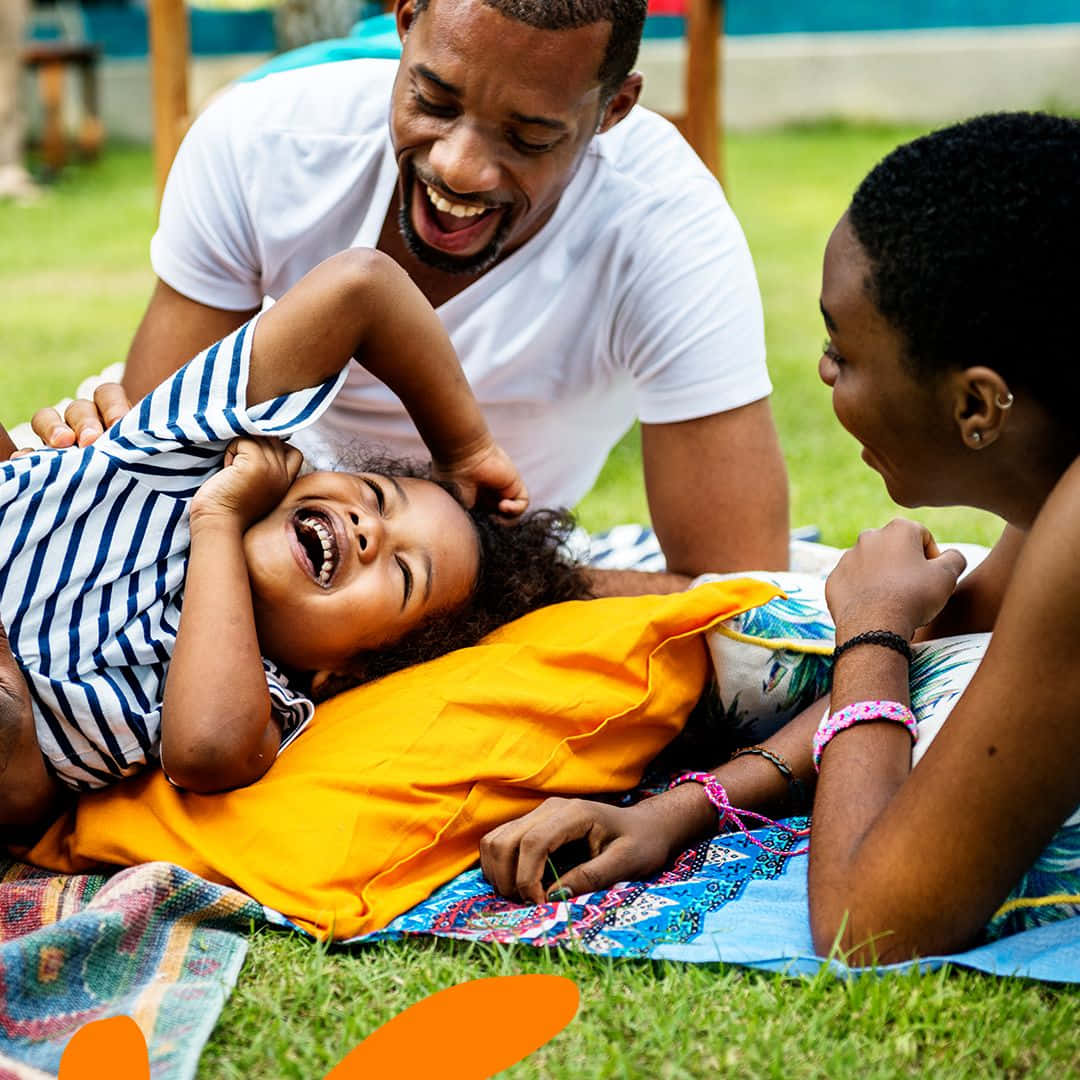 A beautiful black family enjoying bonding time together.