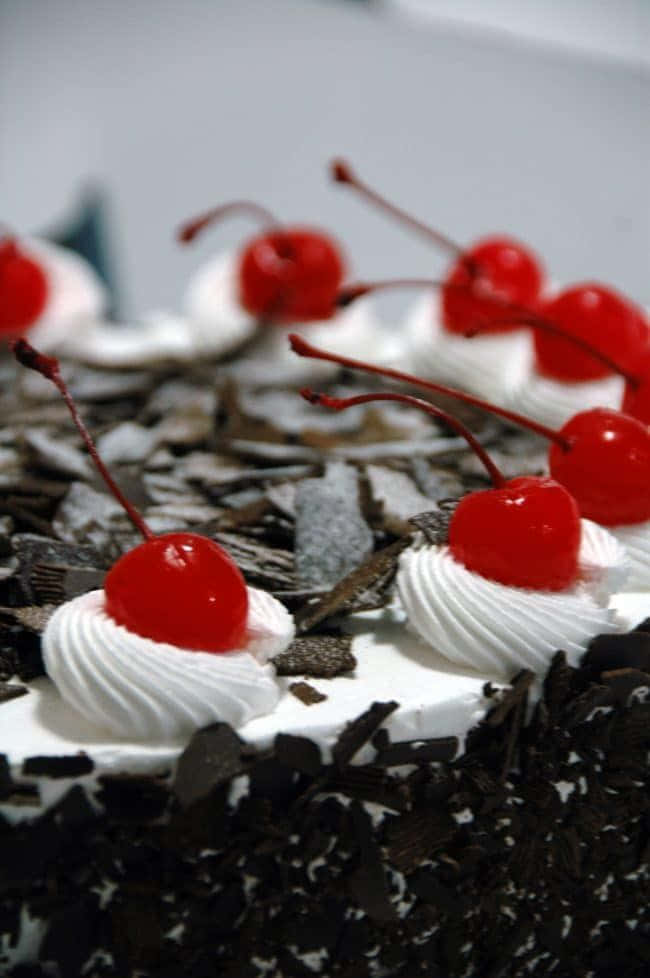 Enjoy a Sweet Treat of Classic Black Forest Cake Wallpaper