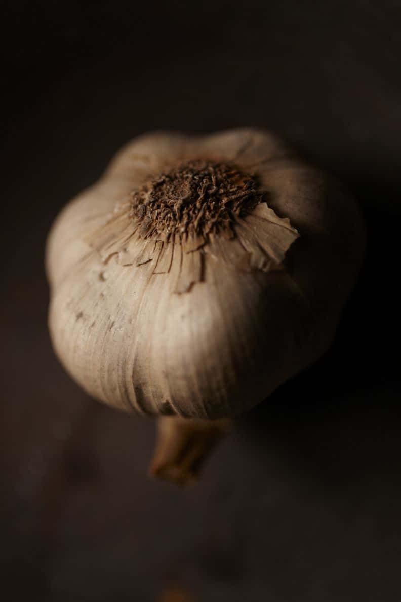 Geniet Van De Unieke Smaak Van Zwarte Knoflook Achtergrond