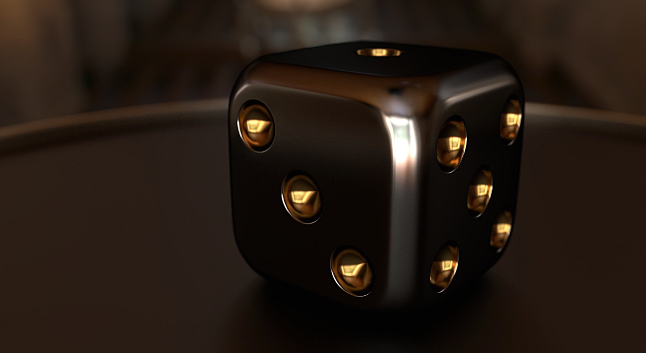 A Black And Gold Dice On A Table