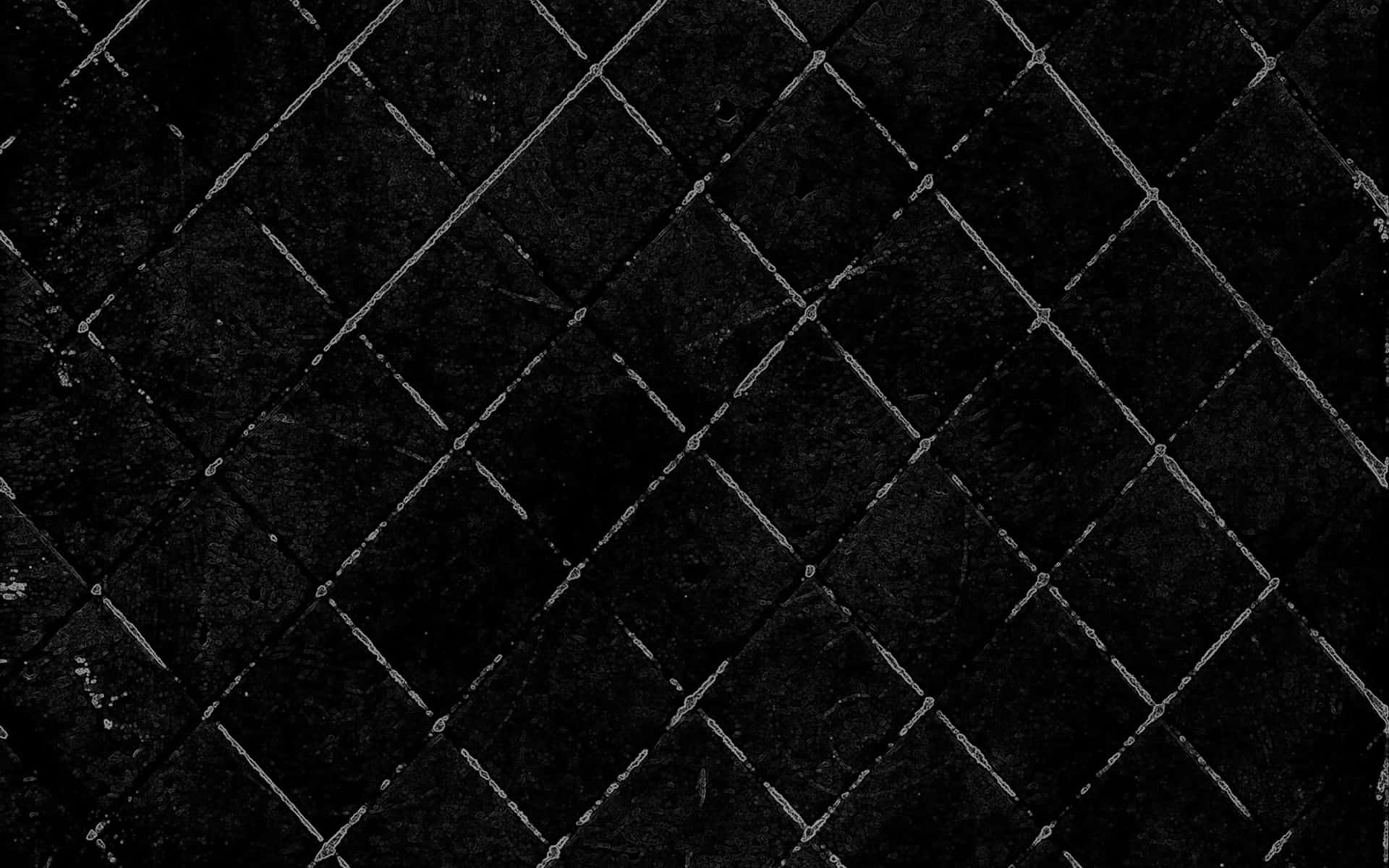 A Black And White Pattern With A Diamond Pattern