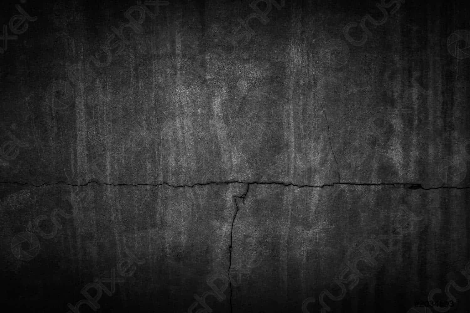 A dark and textured background of black grunge. Wallpaper