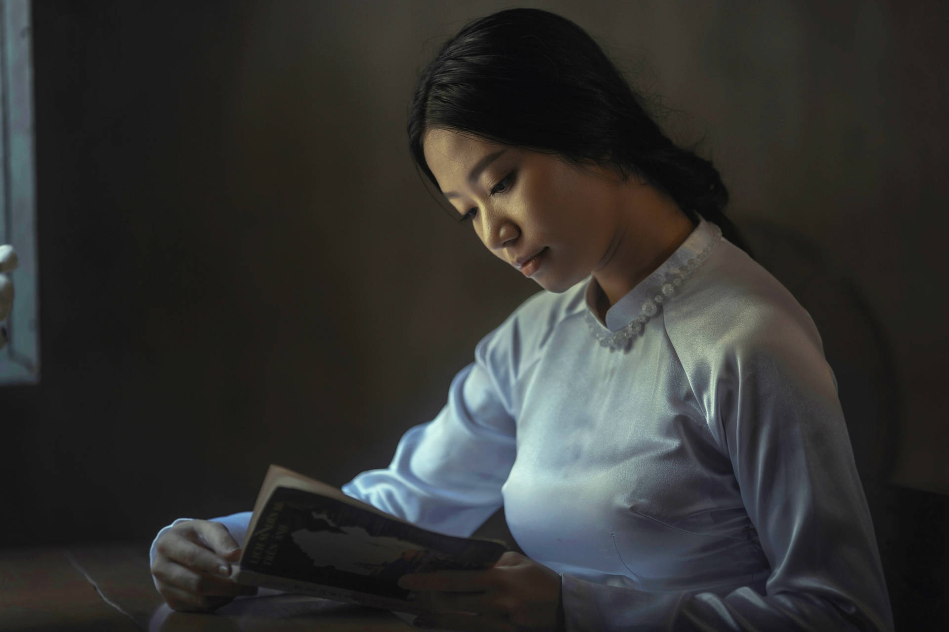 Black-haired Woman Reading Book