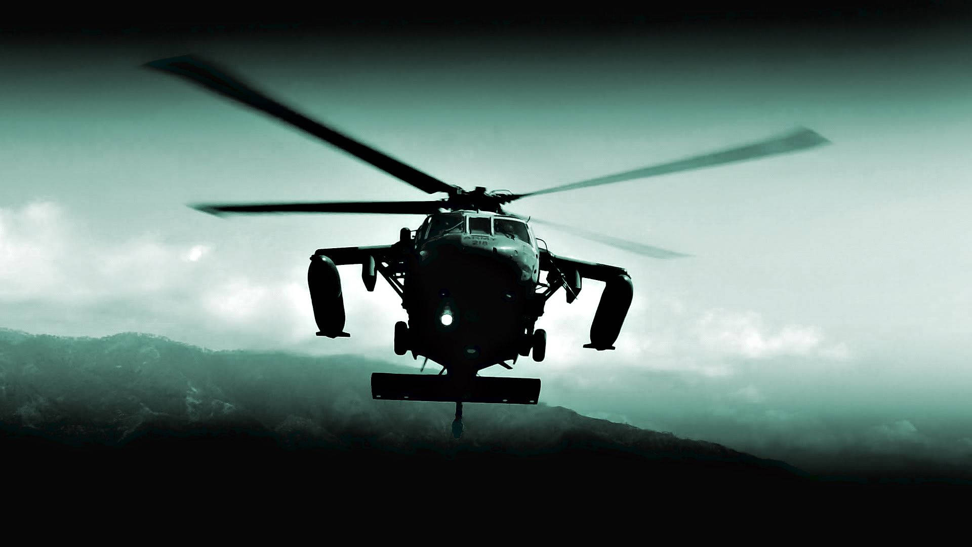 A view of a U.S. Army Black Hawk Helicopter in action Wallpaper
