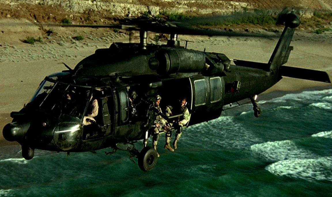 Soldiers On Black Hawk Helicopter Edge Wallpaper