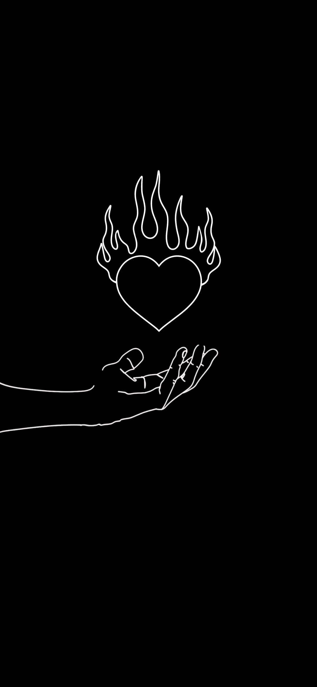 A Hand Holding A Heart With Flames On It