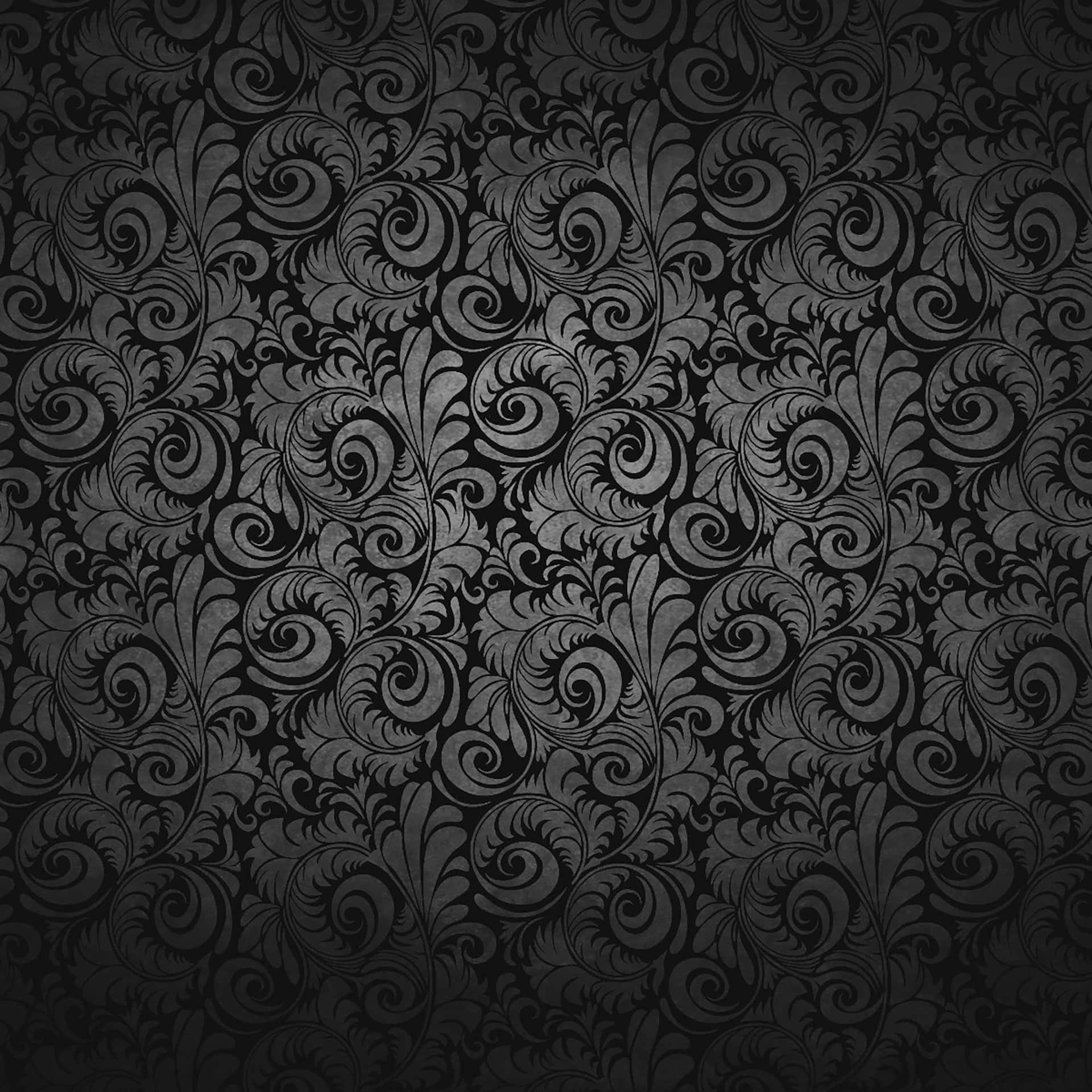 Black Ipad With Spiral Abstract Patterns Wallpaper