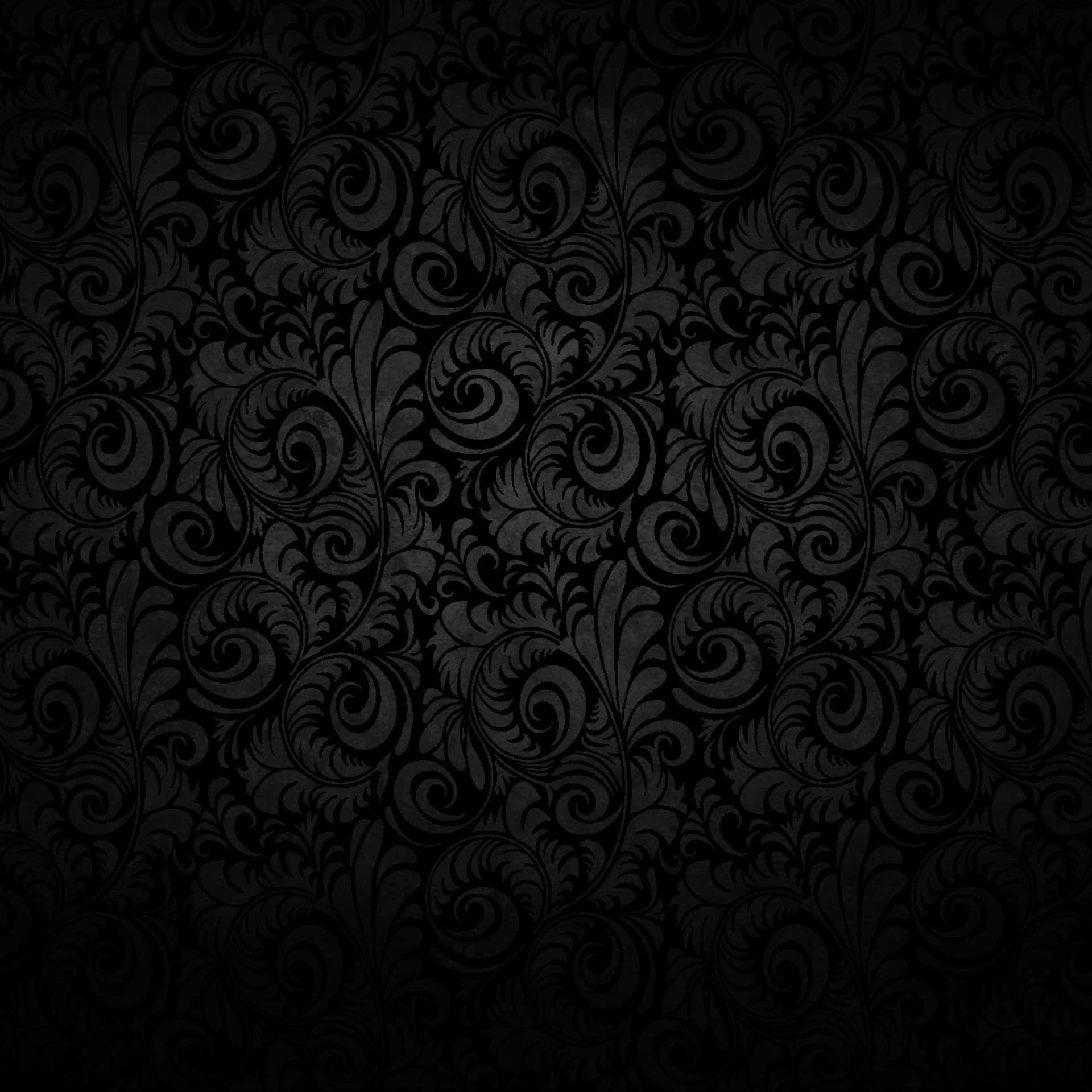 Black Ipad With Spiral Abstract Patterns Wallpaper