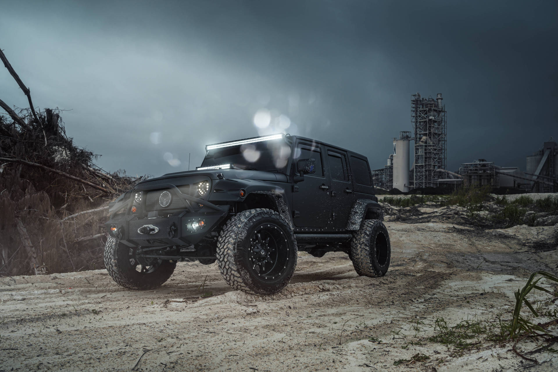 Rugged Black Jeep Wrangler in Construction Site Wallpaper