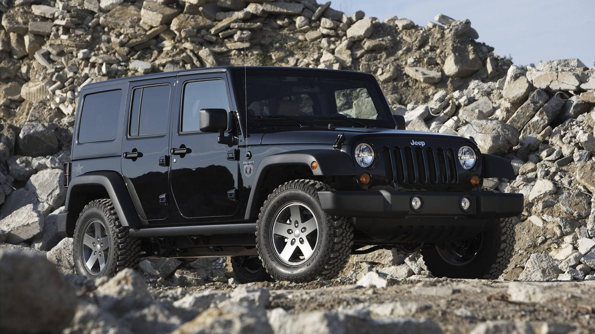 - "Black Jeep Wrangler Dominating the Rough and Rocky Terrain" Wallpaper