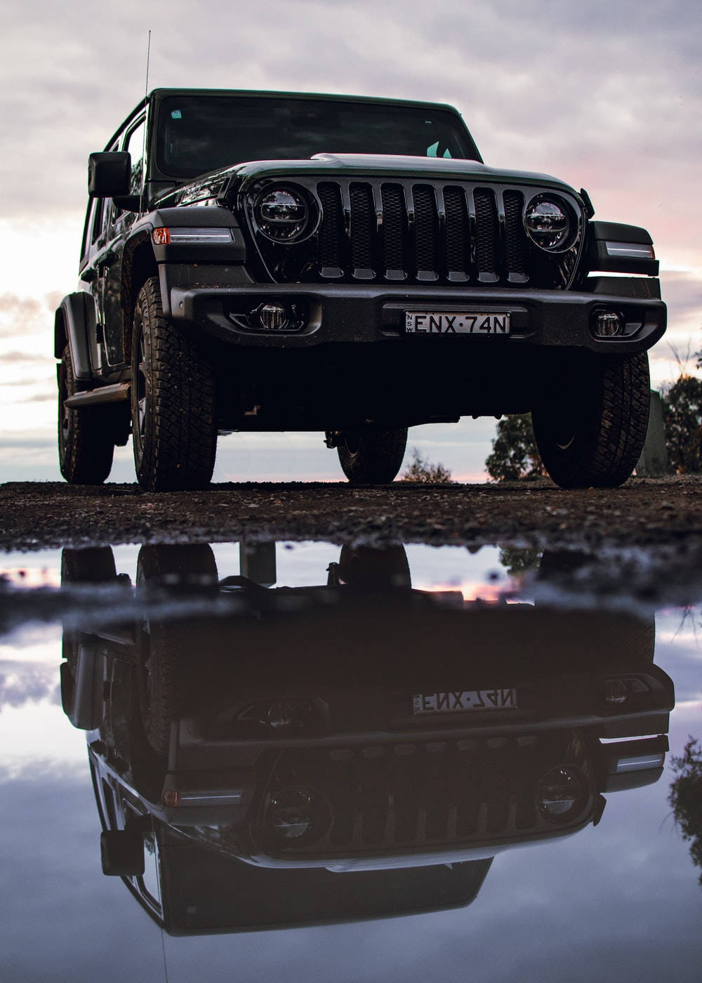 Download Black Jeep Wrangler Reflection On Water Wallpaper 