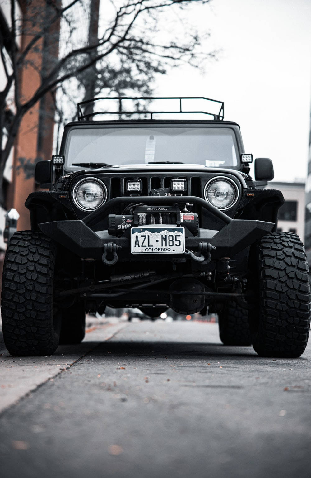 Download Black Jeep Wrangler With Huge Tires Wallpaper 
