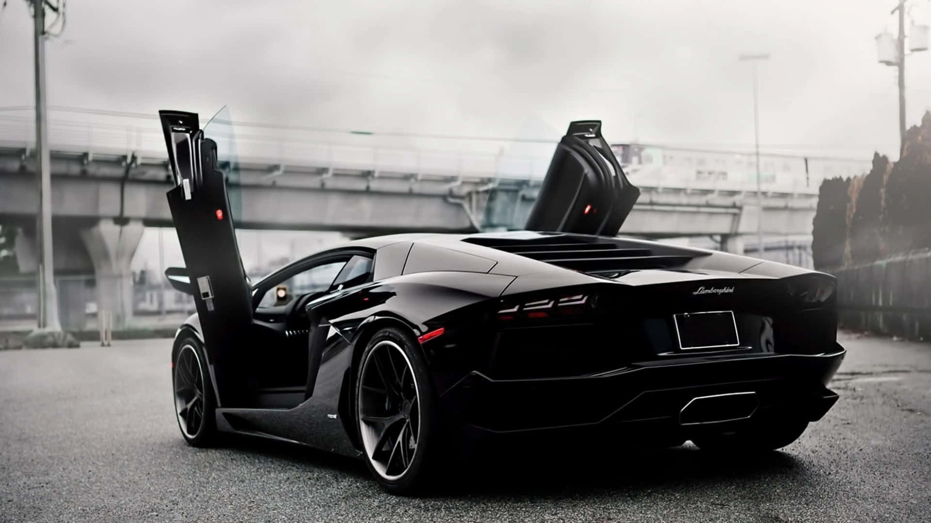 Black Lamborghini Aventador With Open Doors Wallpaper