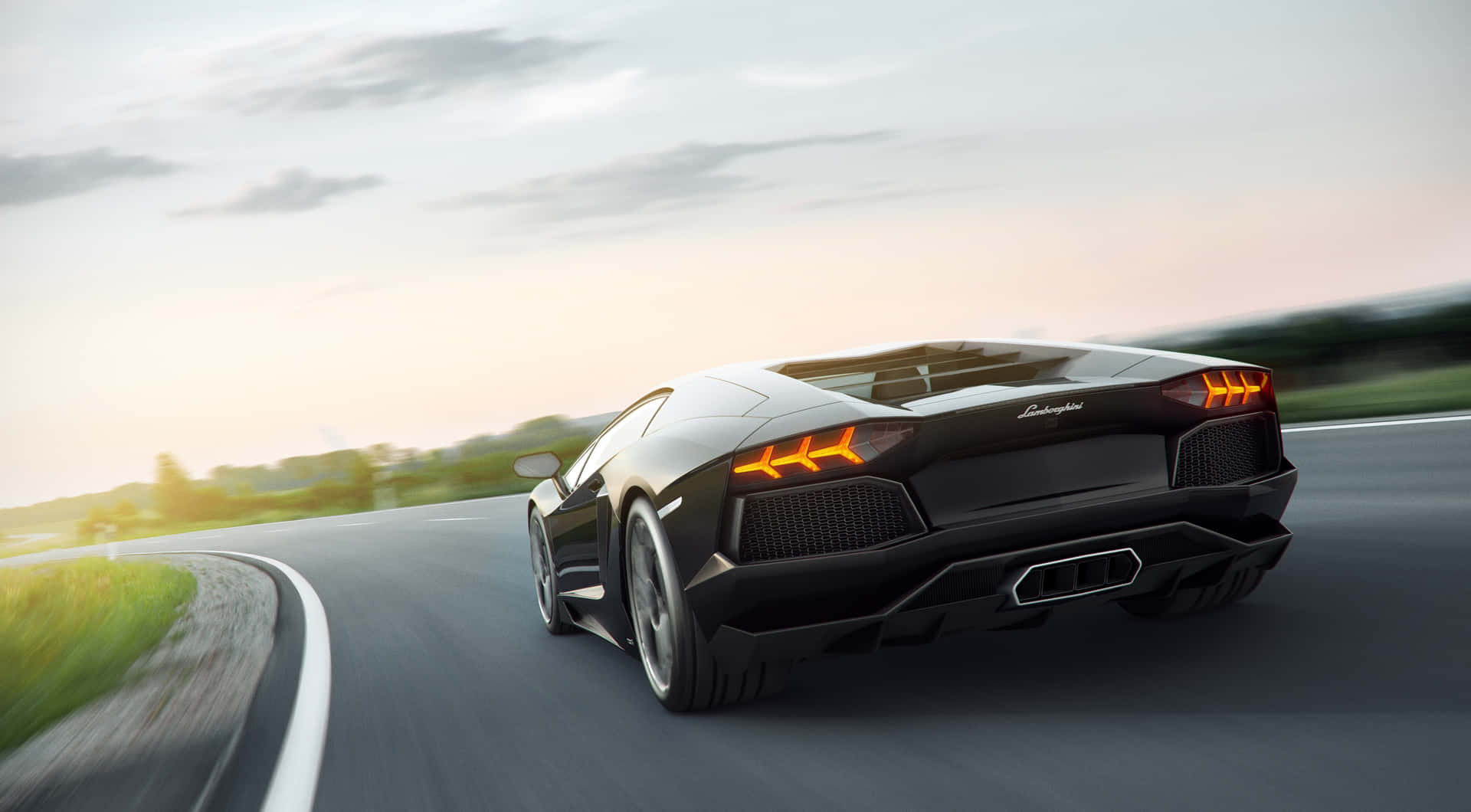 Black Lamborghini Speeding On Road Wallpaper