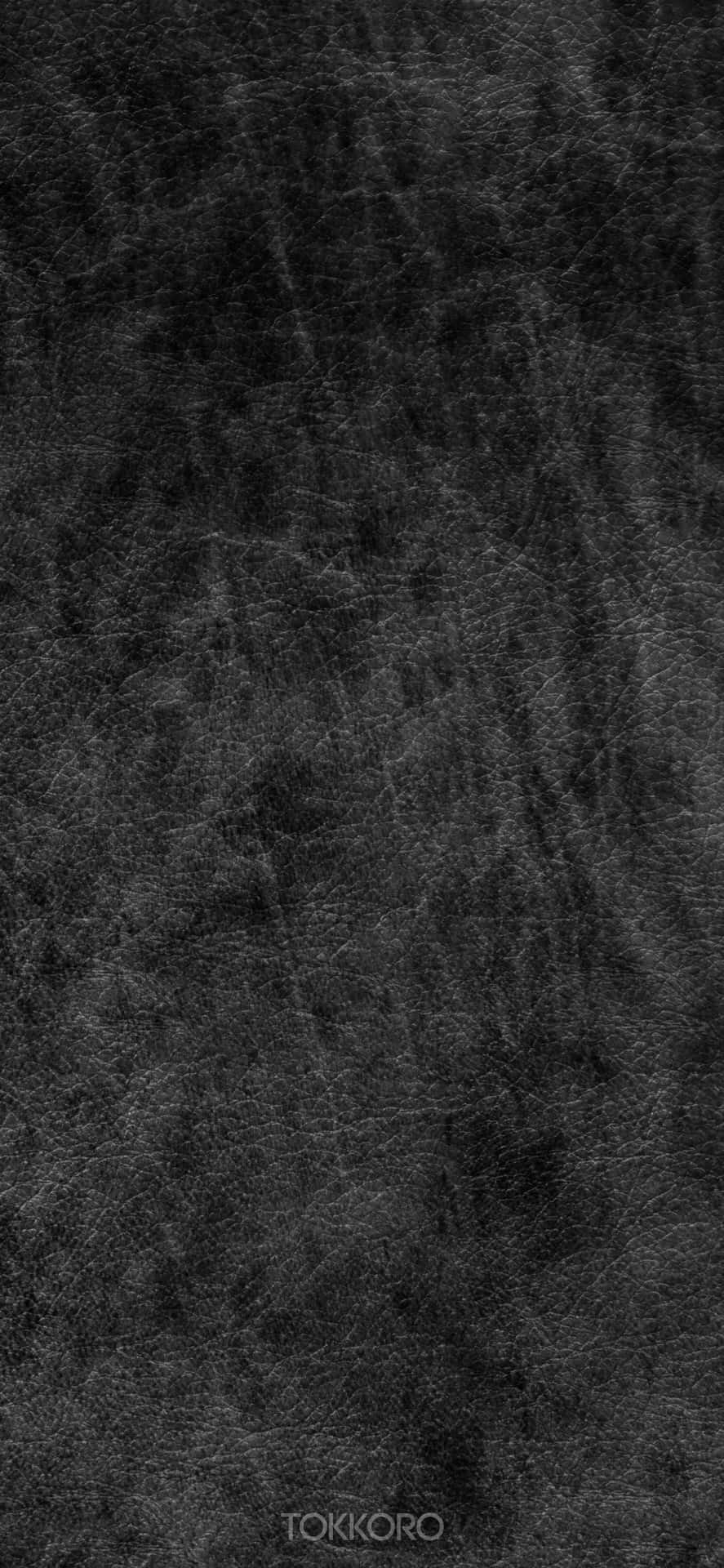 Schwarzeslederstruktur-hintergrund Wallpaper