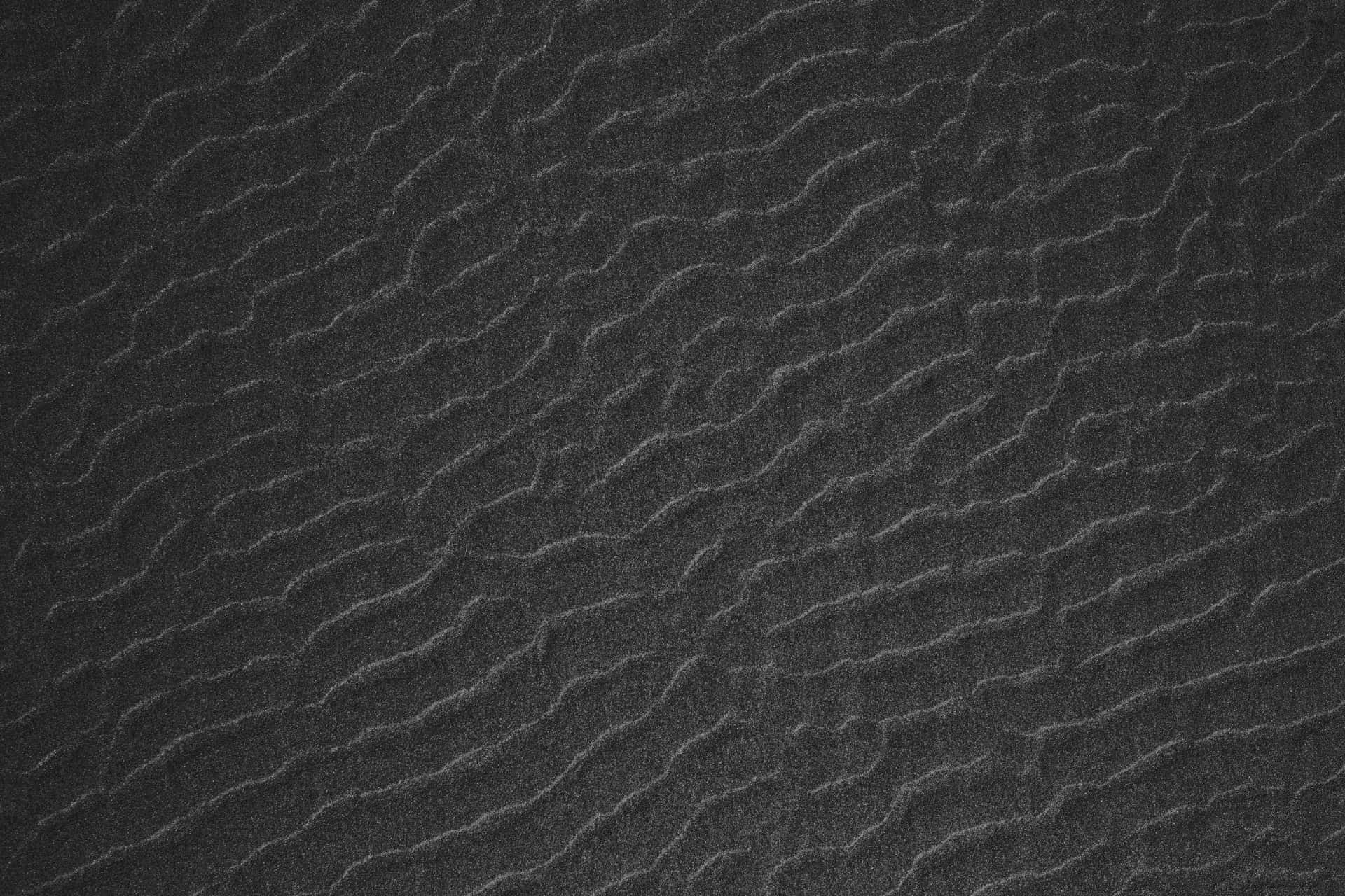 A Black And White Photo Of A Sand Texture Wallpaper