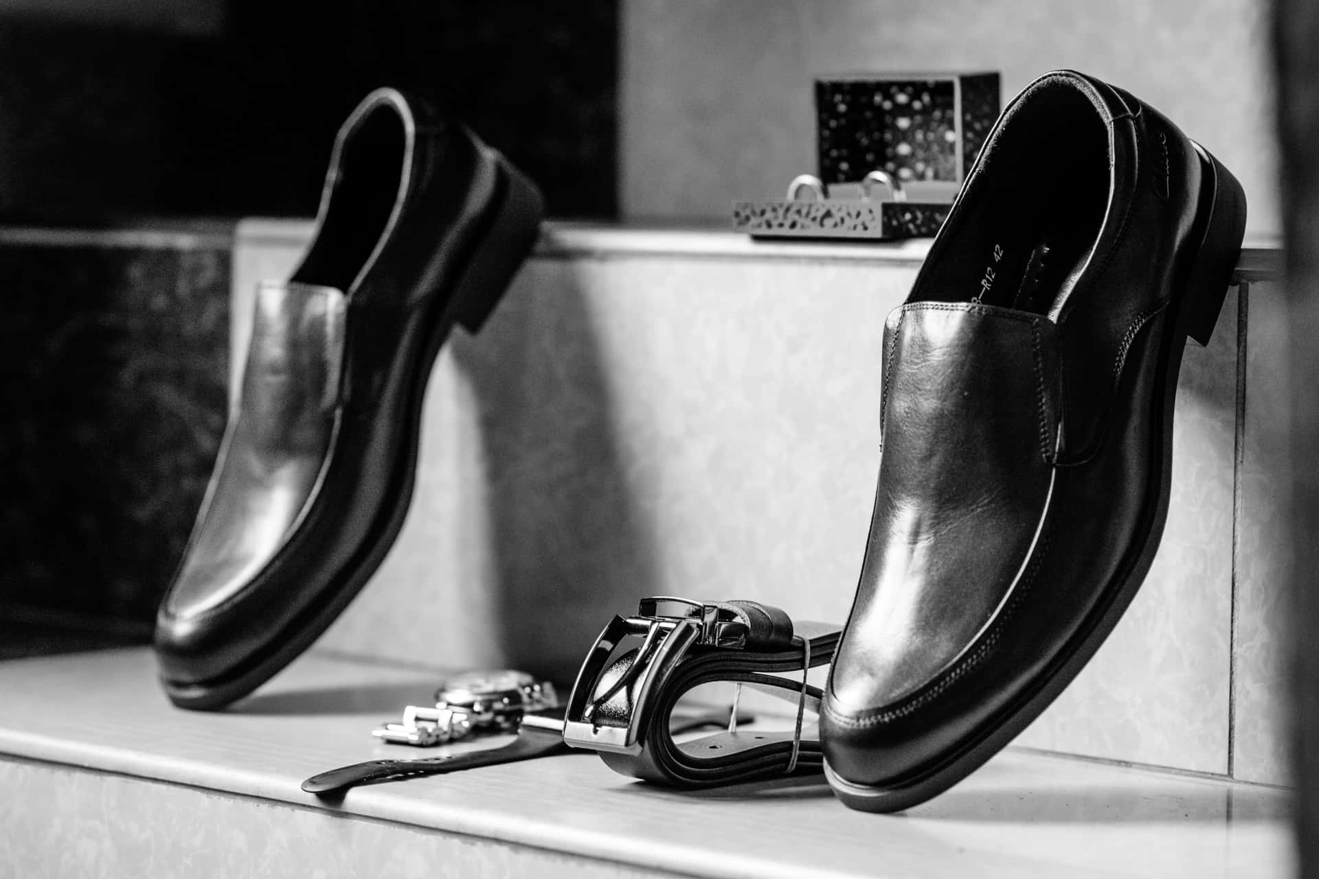 Black And White Photo Of A Pair Of Black Shoes