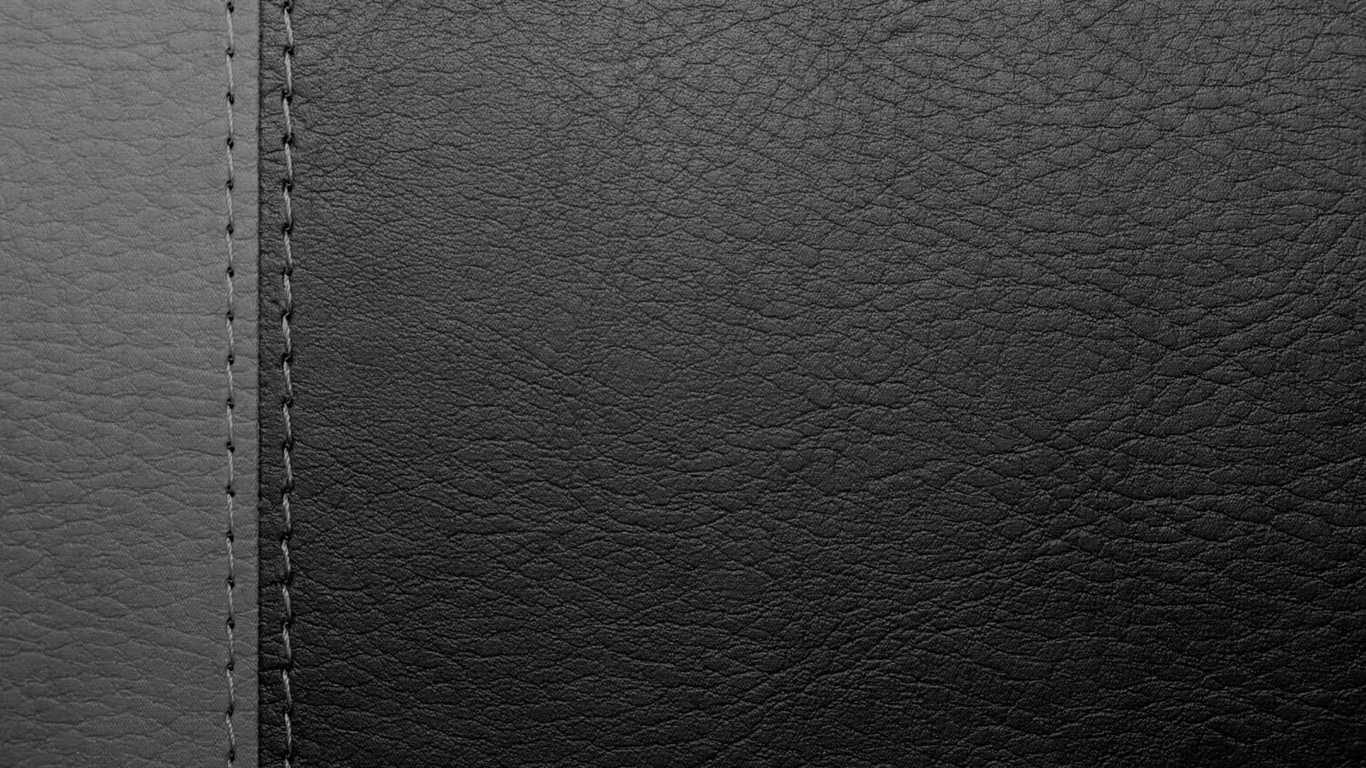 Enjoy the luxury of black leather. Wallpaper