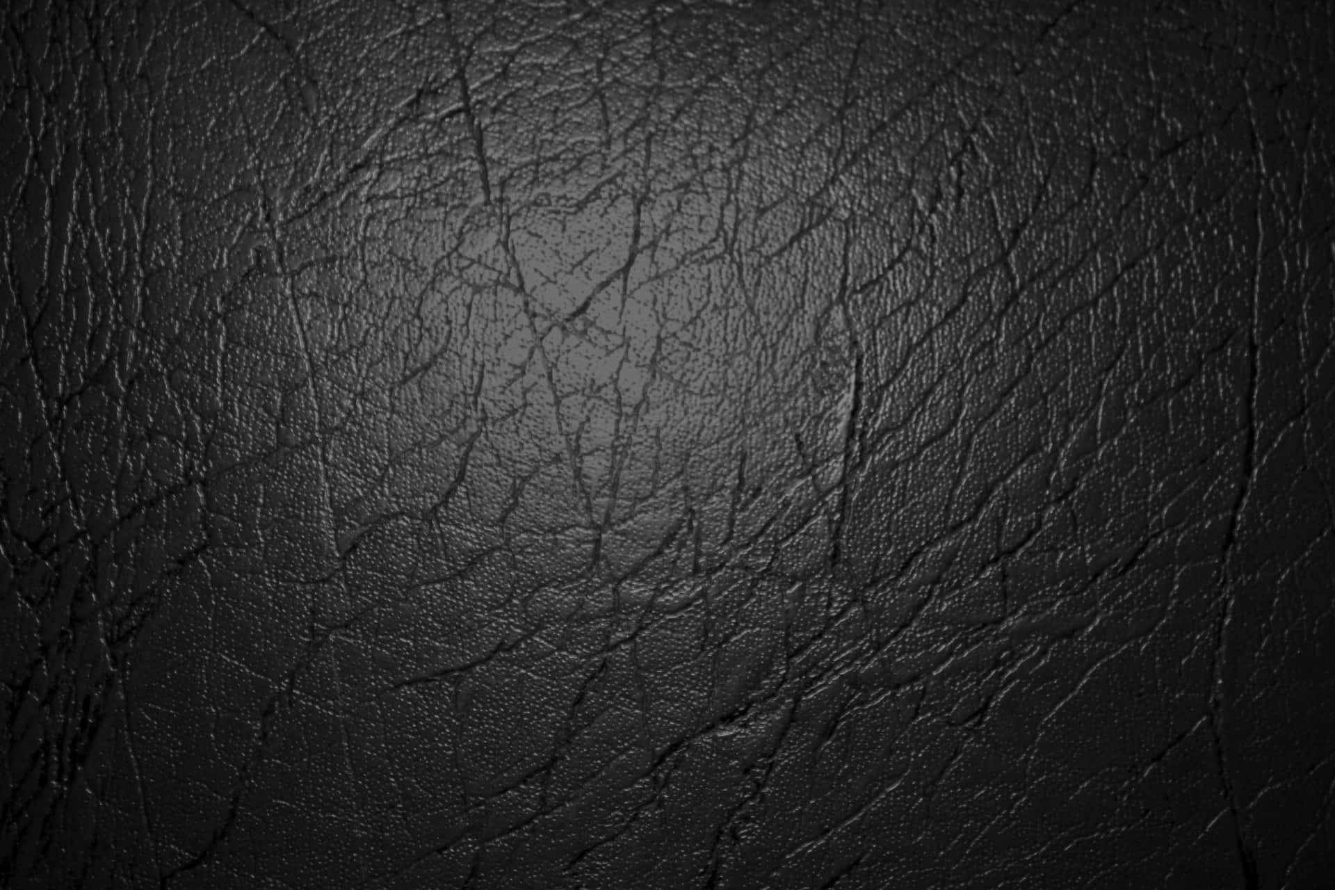 Luxurious black leather for a stylish look Wallpaper