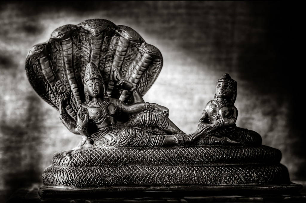Statuetta Del Signore Nero Vishnu Sfondo