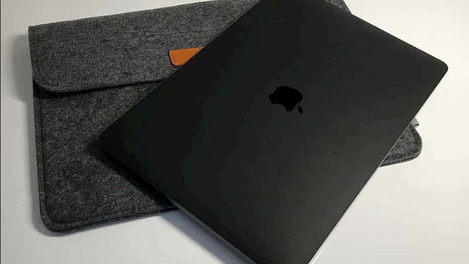 Get Ready for a Professional Experience with the Black Macbook Wallpaper