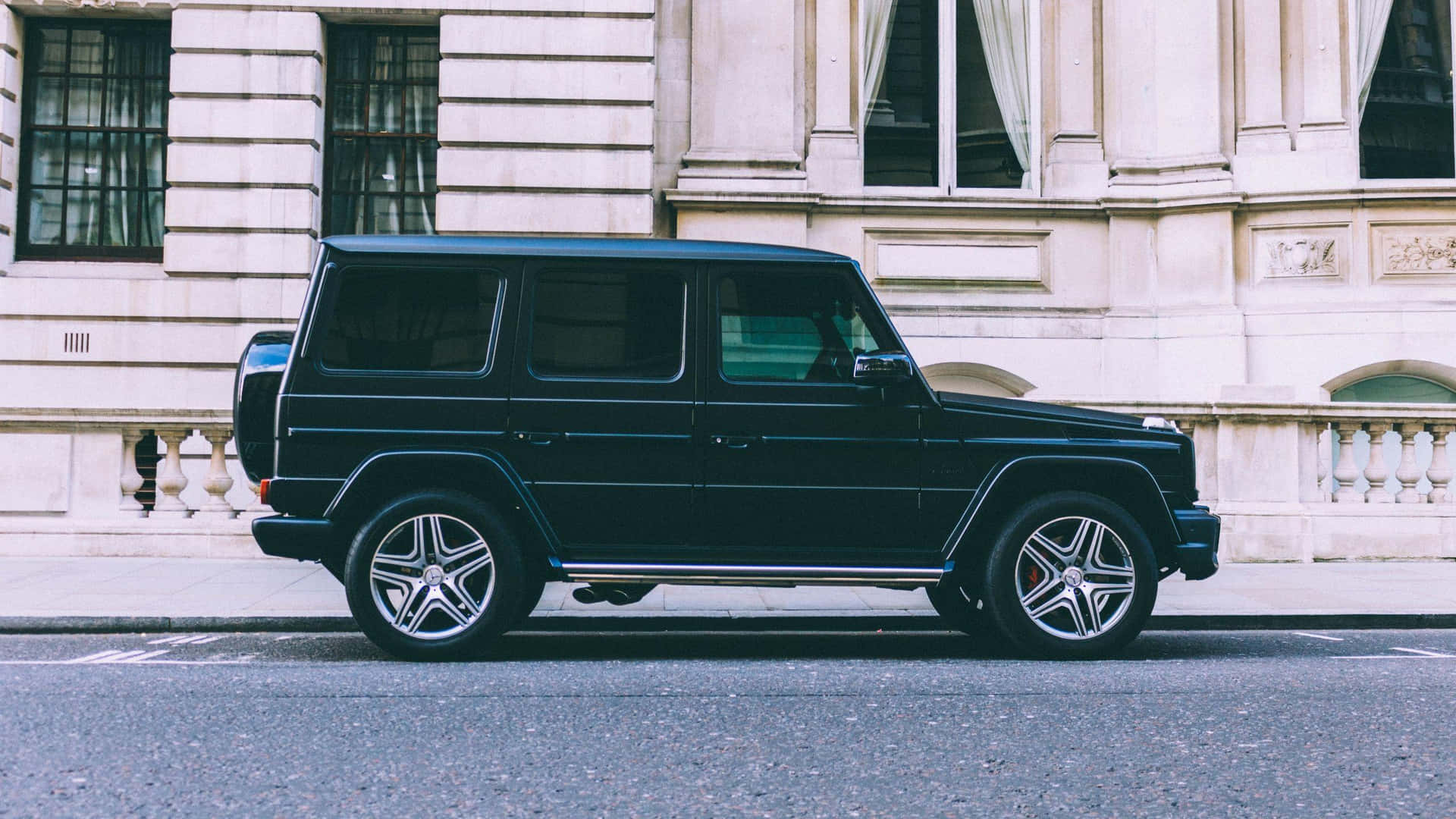 Black Mercedes G Wagon Urban Setting Wallpaper