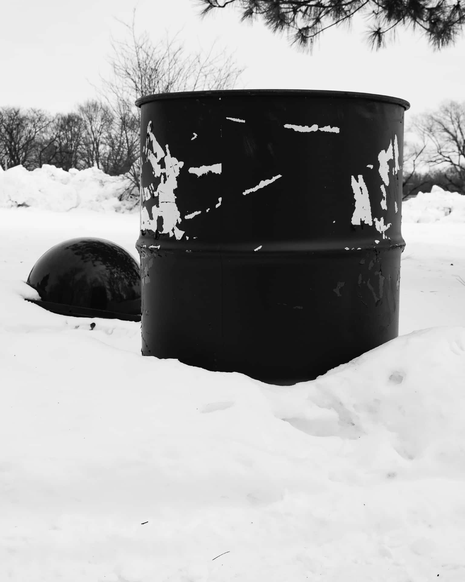 Black Metal Trash Can In Snow Wallpaper